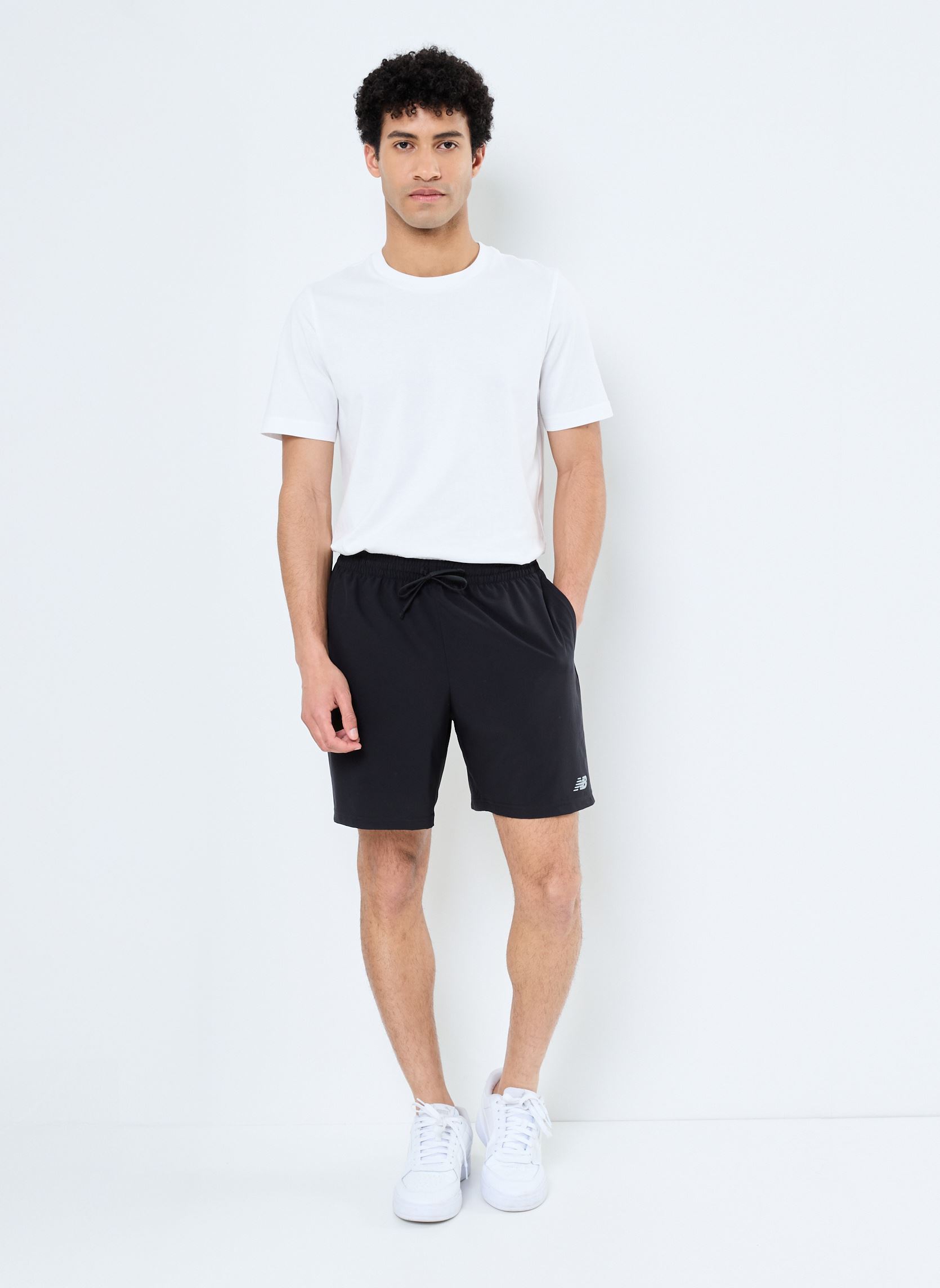 Shorts de sport Sport Essentials Short 7 homme noir New Balance Shorts de sport Sport Essentials Short 7 homme noir Black