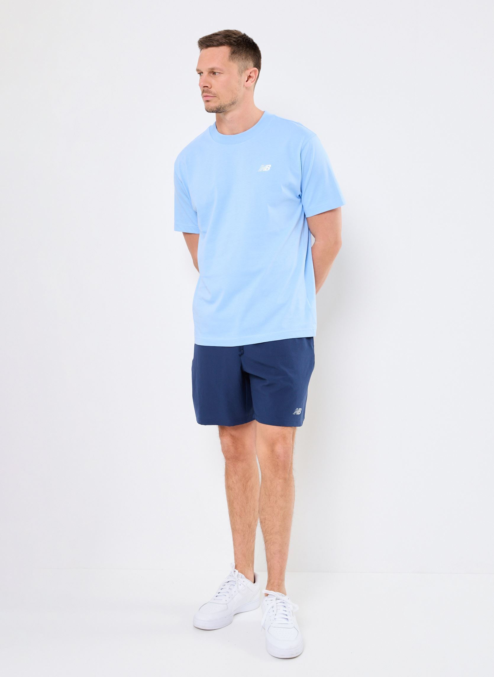 Sportshorts Sport Essentials Short 7 heren blauw New Balance Sportshorts Sport Essentials Short 7 heren blauw NB navy