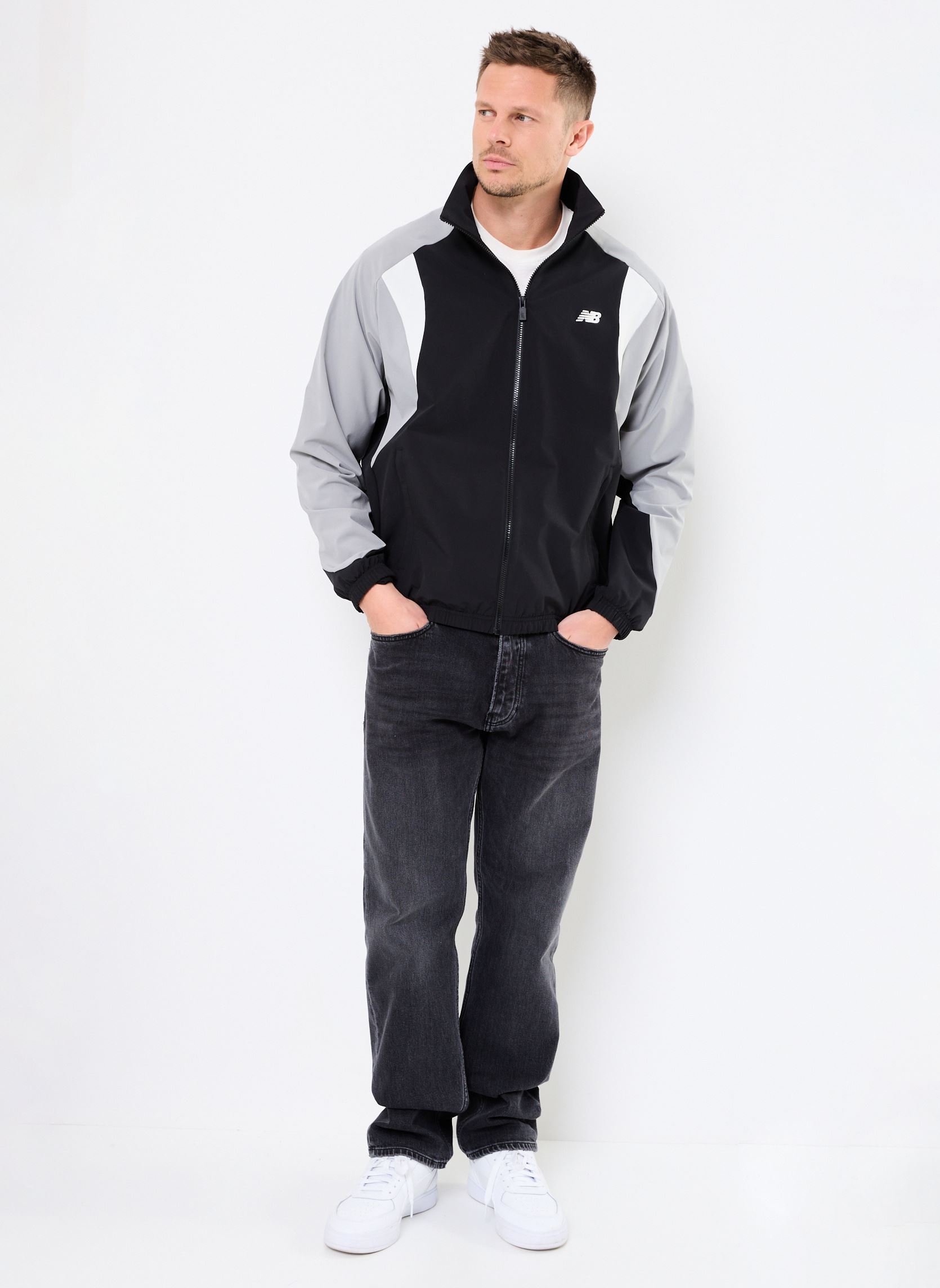 Blousons Woven Track Jacket homme noir New Balance Blousons Woven Track Jacket homme noir Black