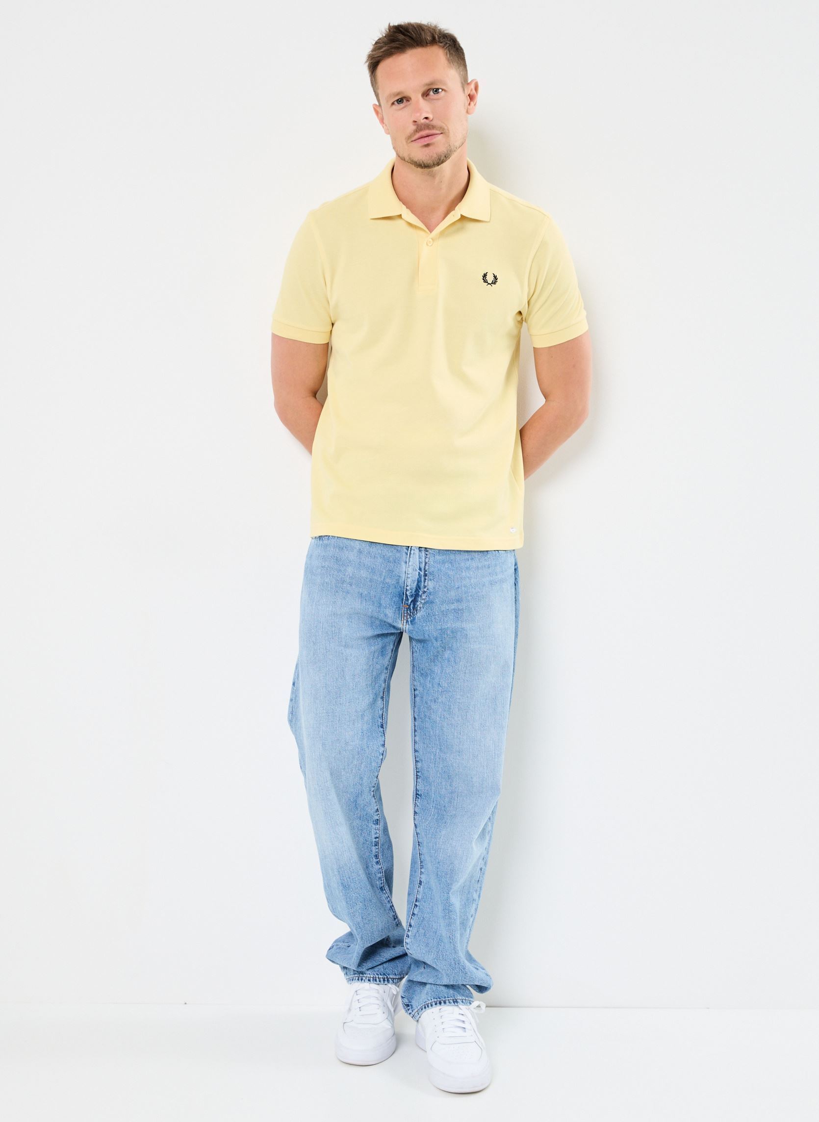Polo a maniche corte THE FRED PERRY SHIRT uomo giallo Fred Perry Polo a maniche corte THE FRED PERRY SHIRT uomo giallo CHAMPIONGOLD/BLK
