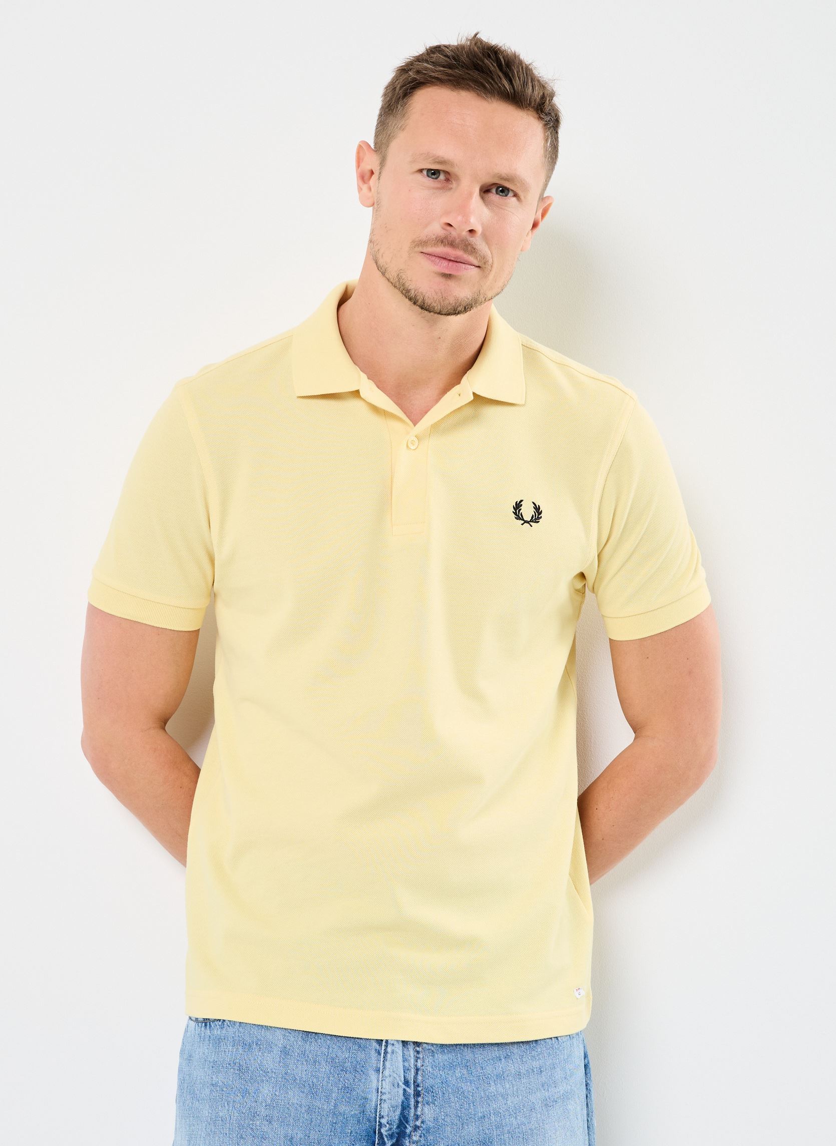 Polo a maniche corte THE FRED PERRY SHIRT uomo giallo Fred Perry Polo a maniche corte THE FRED PERRY SHIRT uomo giallo CHAMPIONGOLD/BLK