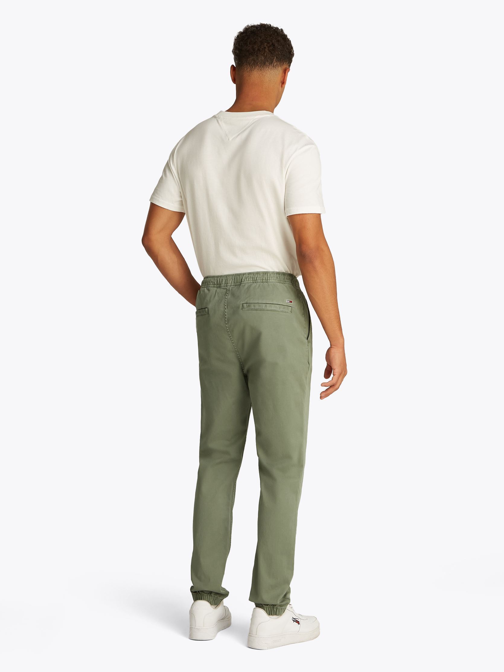 Tute Tjm Austin Jog DM0DM20283 uomo verde Tommy Jeans Tute Tjm Austin Jog DM0DM20283 uomo verde ARUBA GREEN