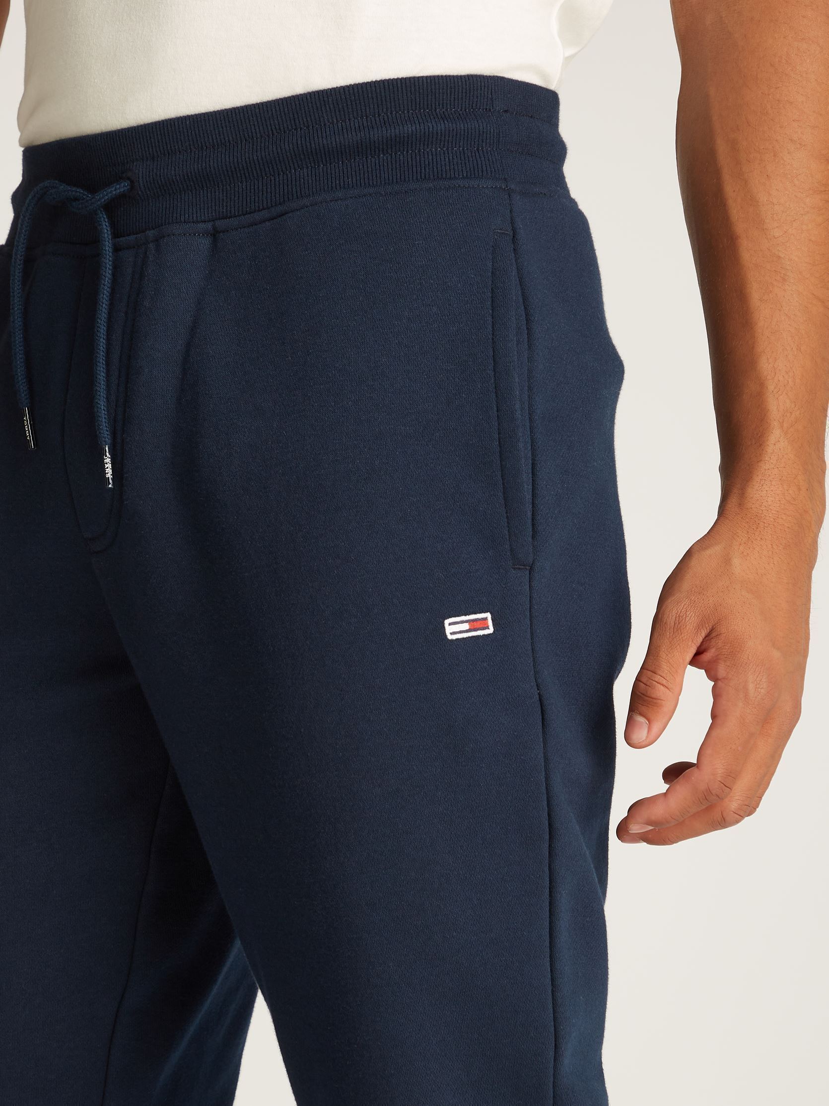 Joggingbroeken Tjm Slim S Flag Swea DM0DM20473 heren blauw Tommy Jeans Joggingbroeken Tjm Slim S Flag Swea DM0DM20473 heren blauw DARK NIGHT NAVY