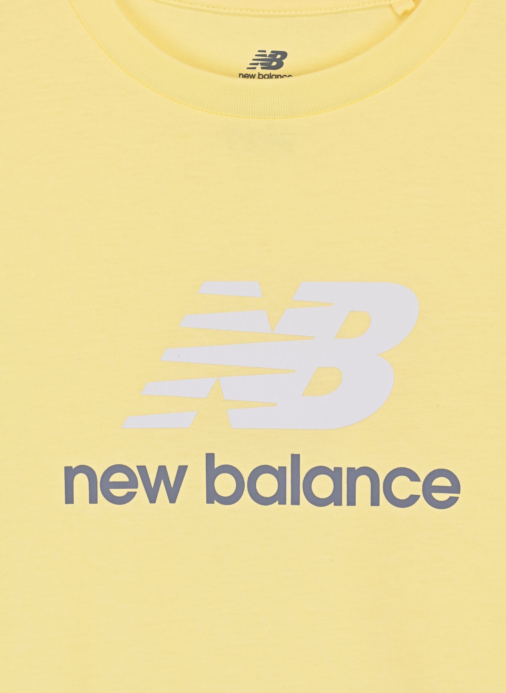 Tee-shirts manches courtes New Balance Jersey Stacked Logo Tee fille jaune New Balance Kids Tee-shirts manches courtes New Balance Jersey Stacked Logo Tee fille jaune PARCHMENT