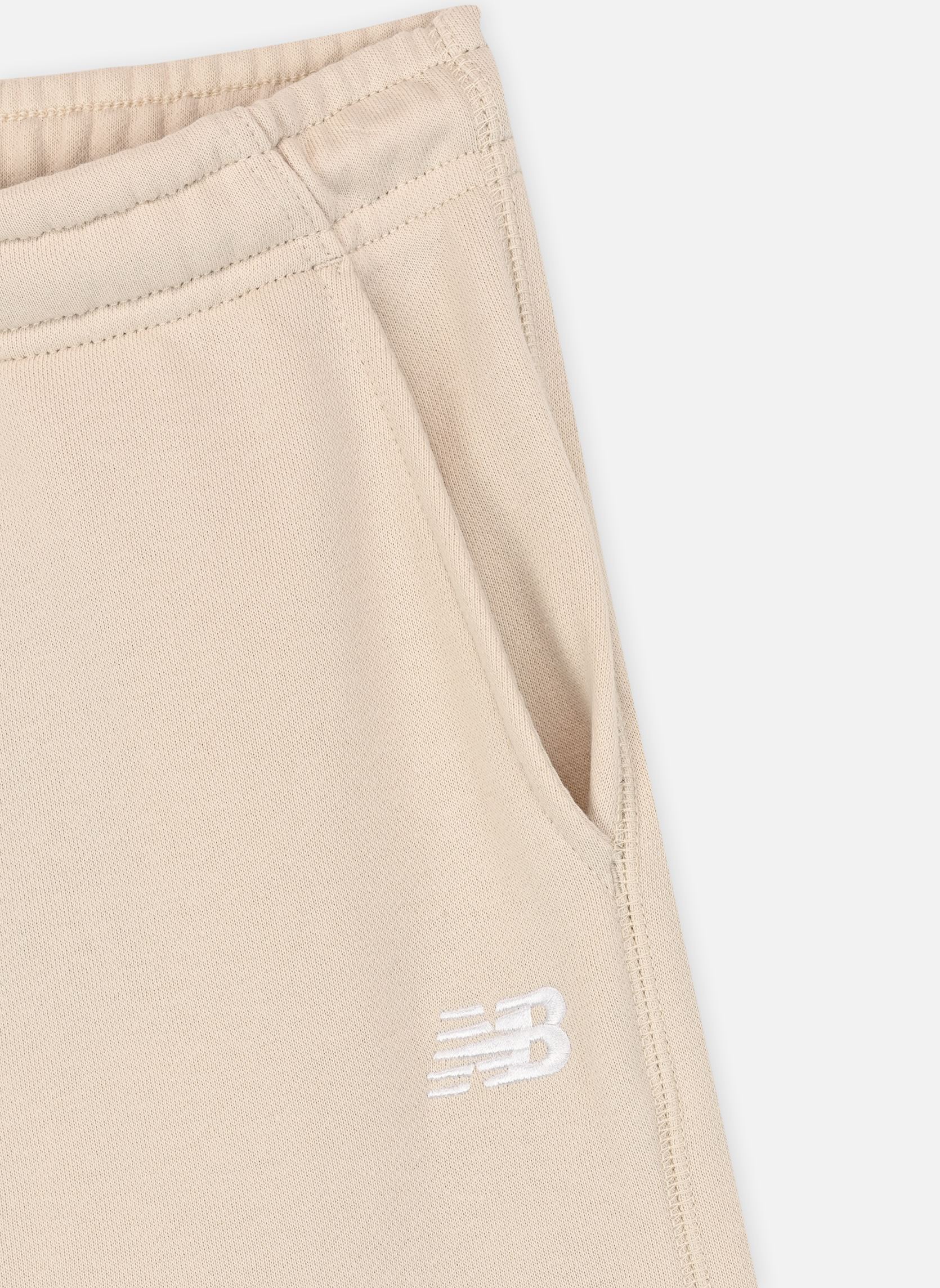 Joggings New Balance French Terry Small Logo Jogg fille beige New Balance Kids Joggings New Balance French Terry Small Logo Jogg fille beige LINEN