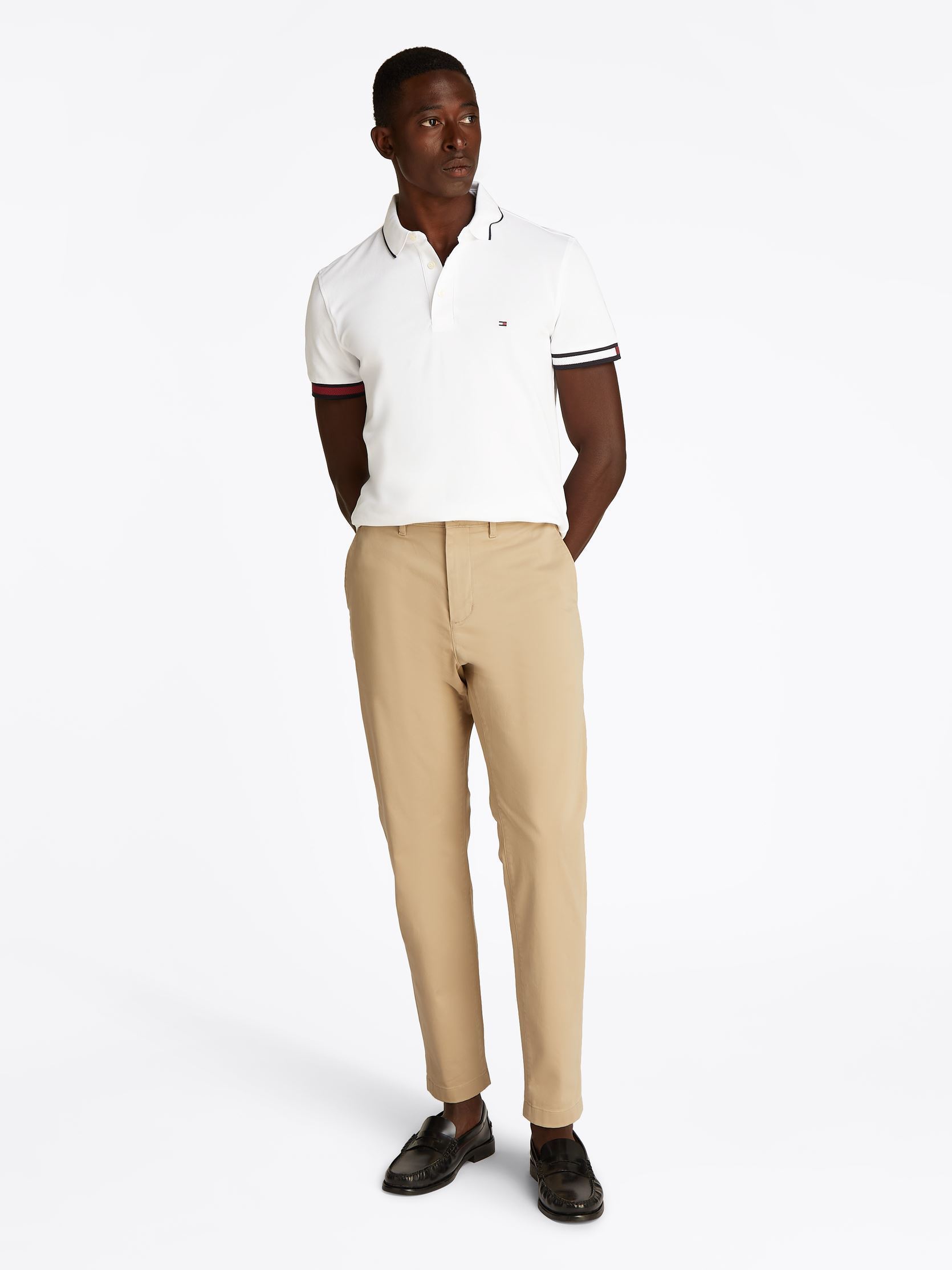 Polos manches courtes Flag Cuff Slim Fit P MW0MW38458 homme blanc Tommy Hilfiger Polos manches courtes Flag Cuff Slim Fit P MW0MW38458 homme blanc WHITE