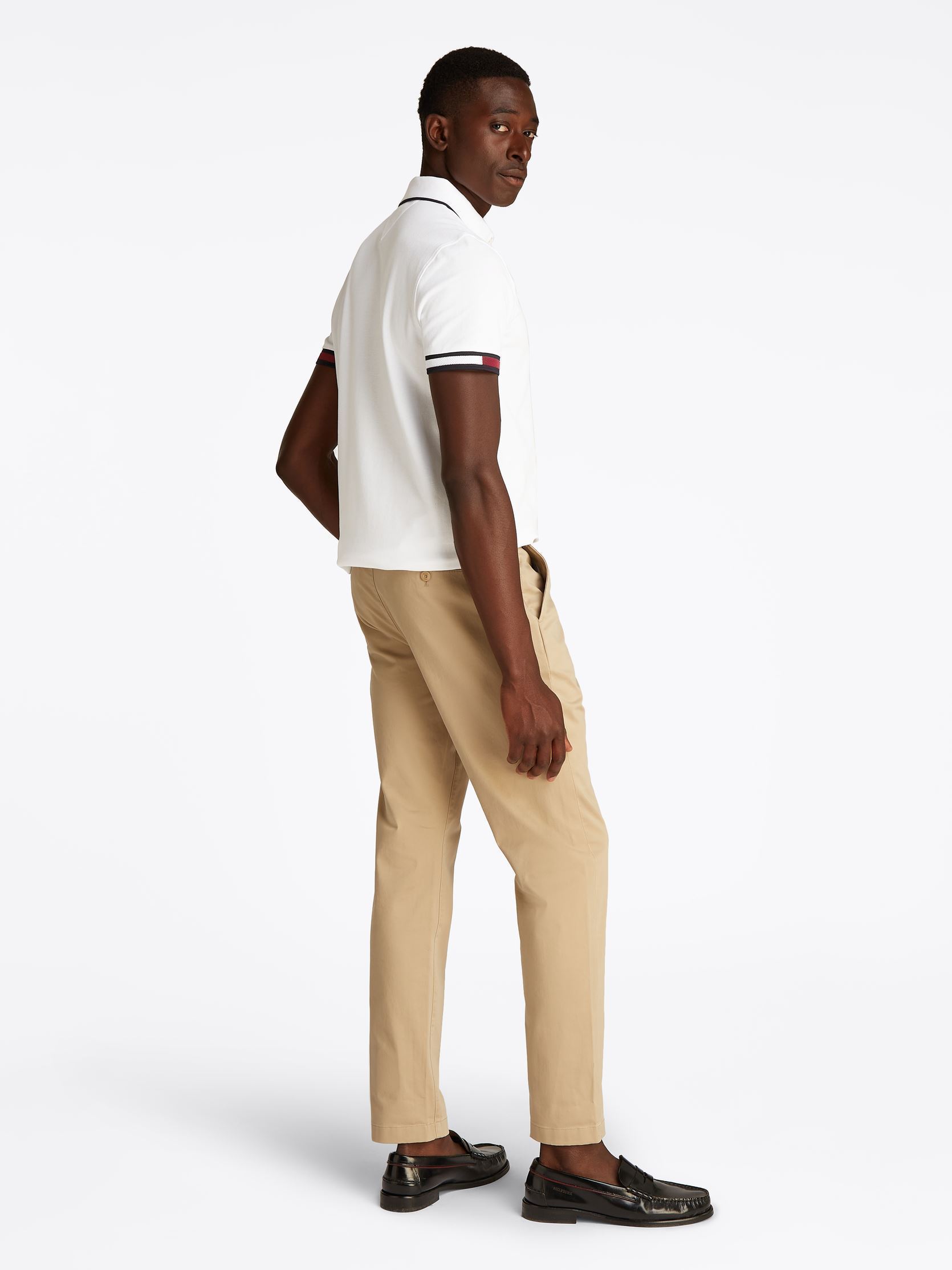Polos manches courtes Flag Cuff Slim Fit P MW0MW38458 homme blanc Tommy Hilfiger Polos manches courtes Flag Cuff Slim Fit P MW0MW38458 homme blanc WHITE