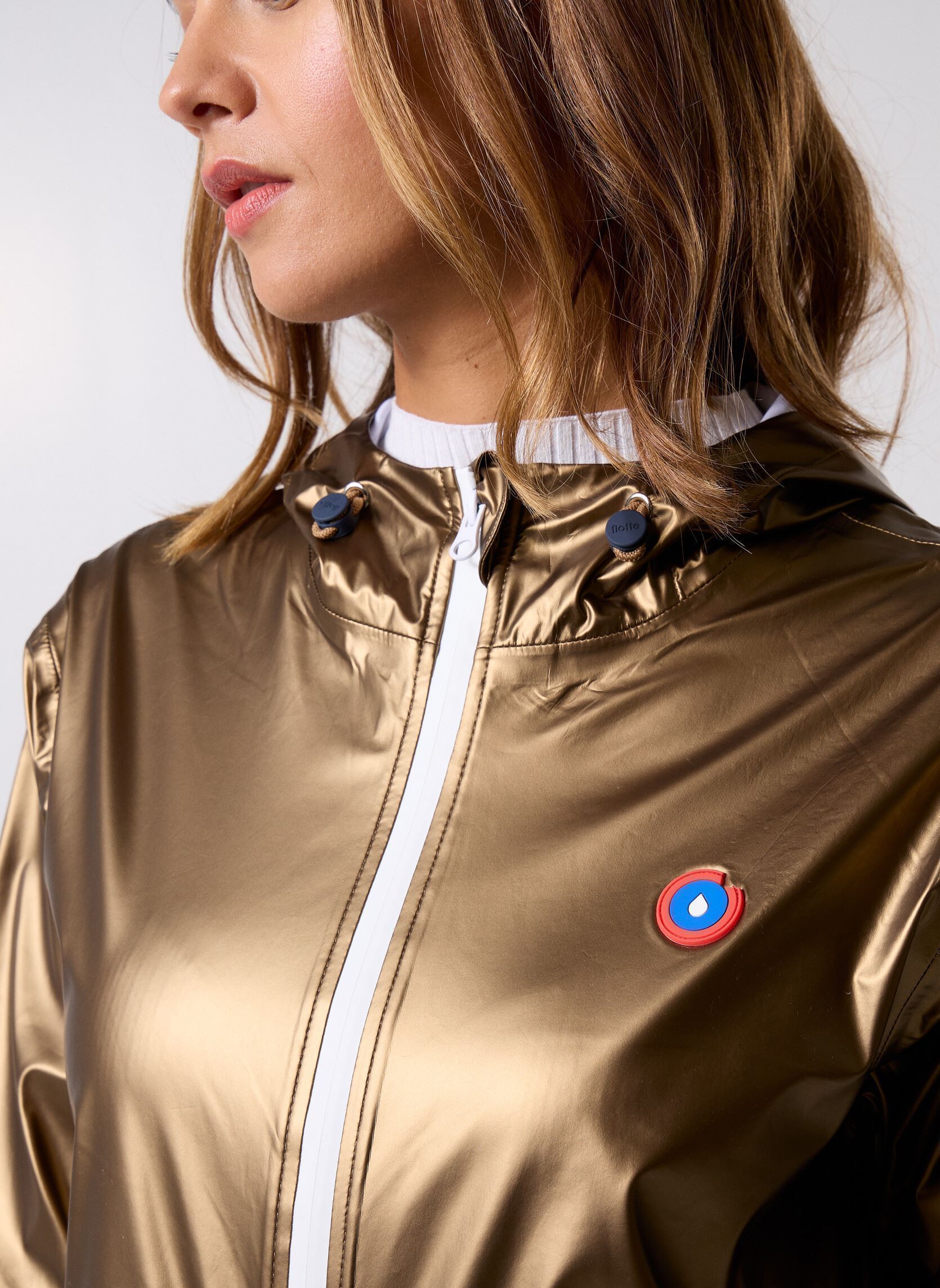 Vestes imperméable Anorak Tech femme or et bronze FLOTTE Vestes imperméable Anorak Tech femme or et bronze Gold