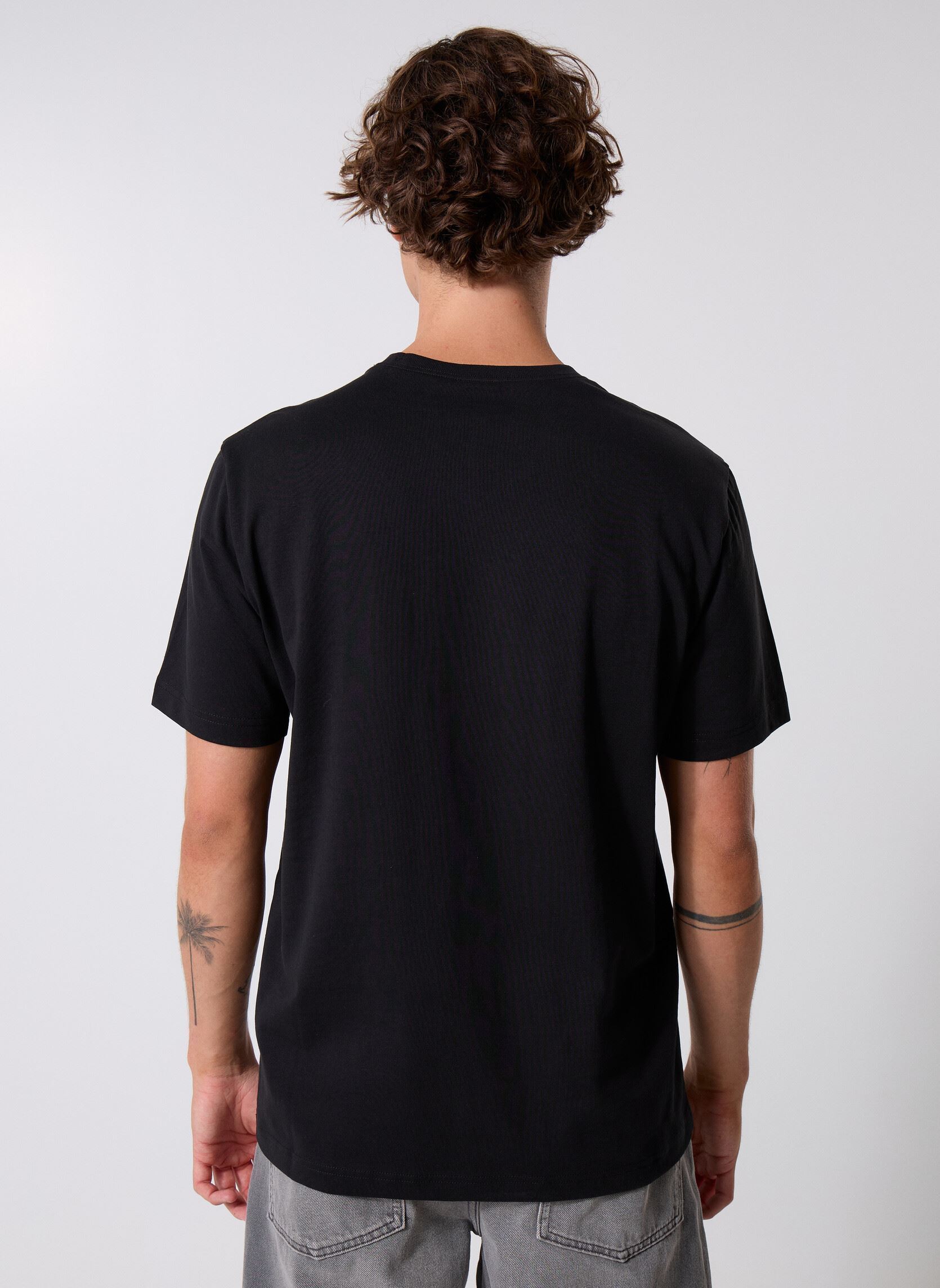 T-shirt a maniche corte 221339 uomo nero Champion T-shirt a maniche corte 221339 uomo nero KK001