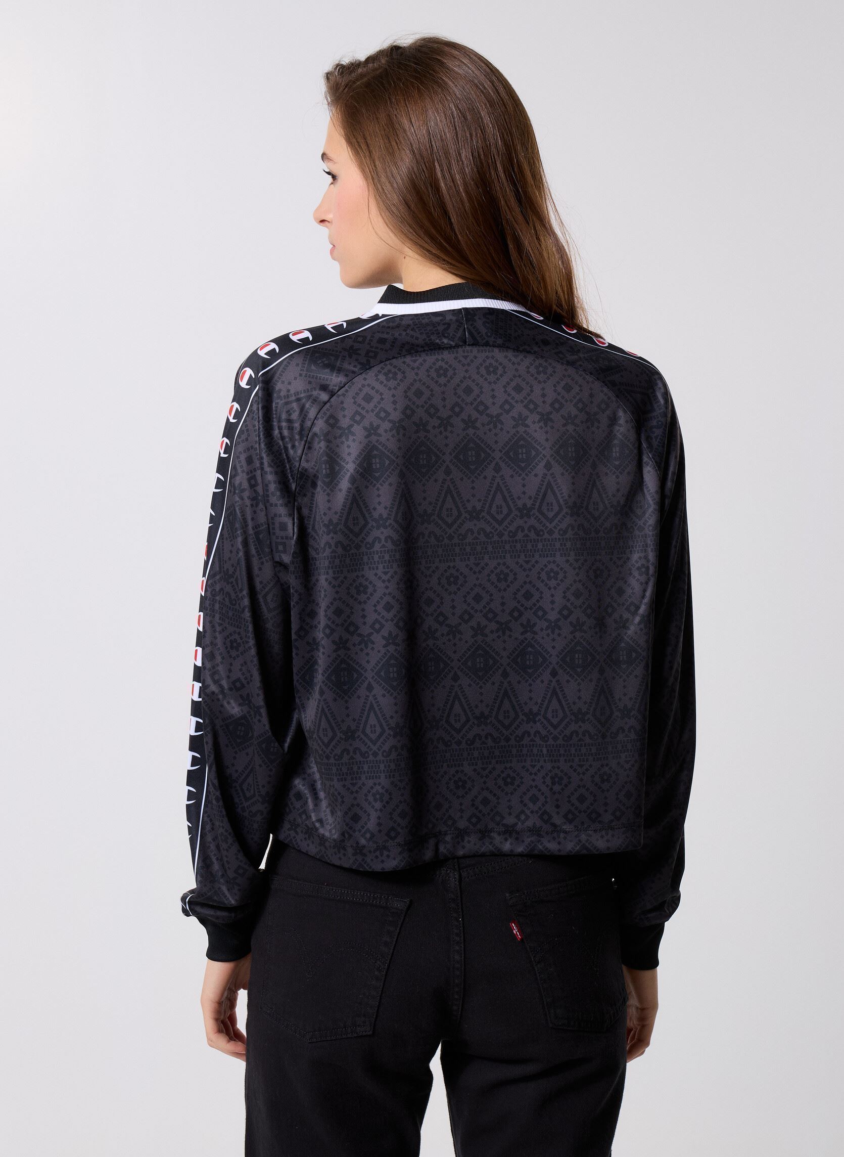 Polo a maniche lunghe 118444 donna nero Champion Polo a maniche lunghe 118444 donna nero KL001