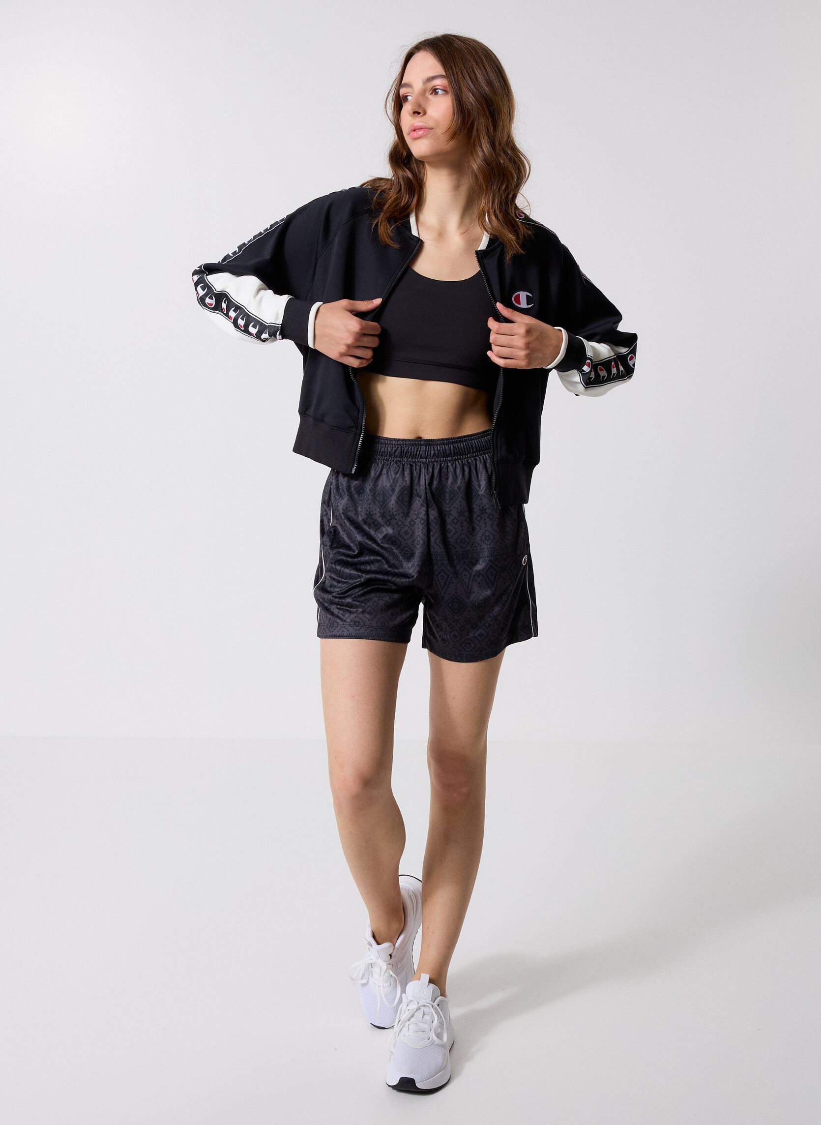 Vestes de survêtement 118373 femme noir Champion Vestes de survêtement 118373 femme noir KK001