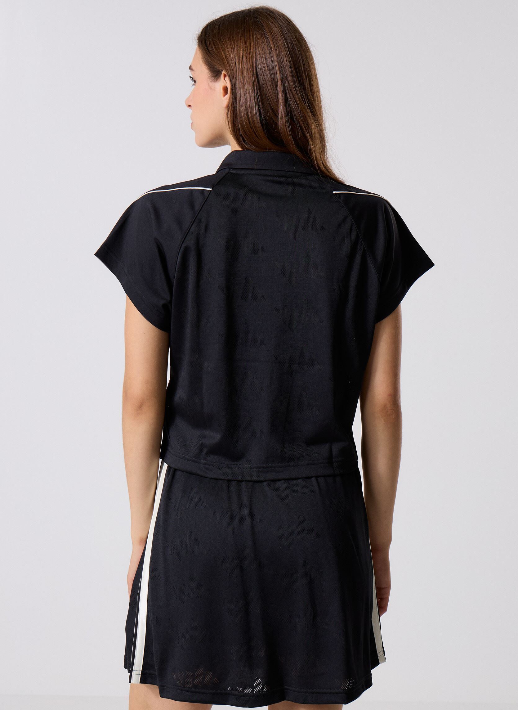 Polo a maniche corte W STA SEAS TOP donna nero adidas sportswear Polo a maniche corte W STA SEAS TOP donna nero Black/Owhite