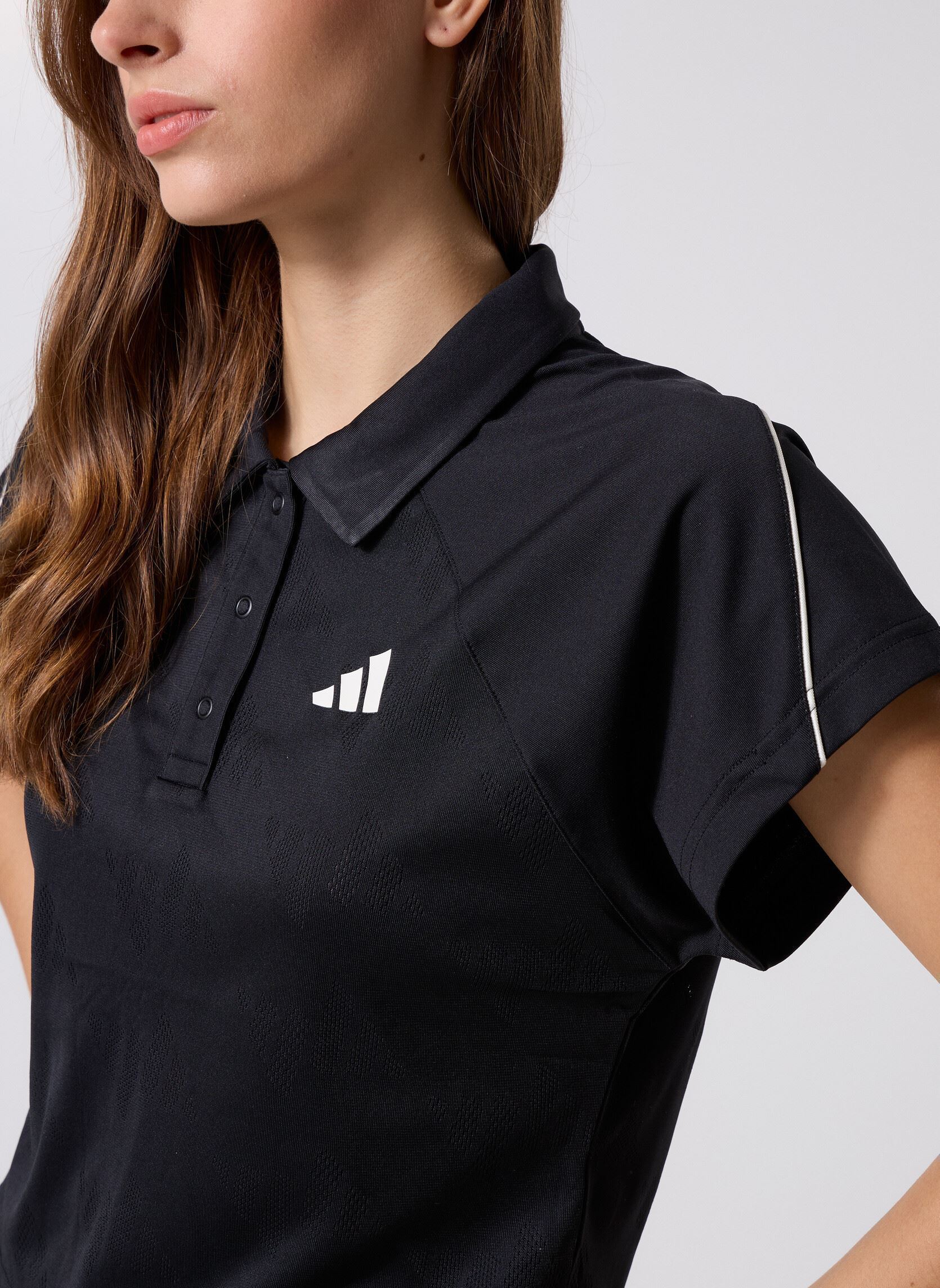 Polo a maniche corte W STA SEAS TOP donna nero adidas sportswear Polo a maniche corte W STA SEAS TOP donna nero Black/Owhite
