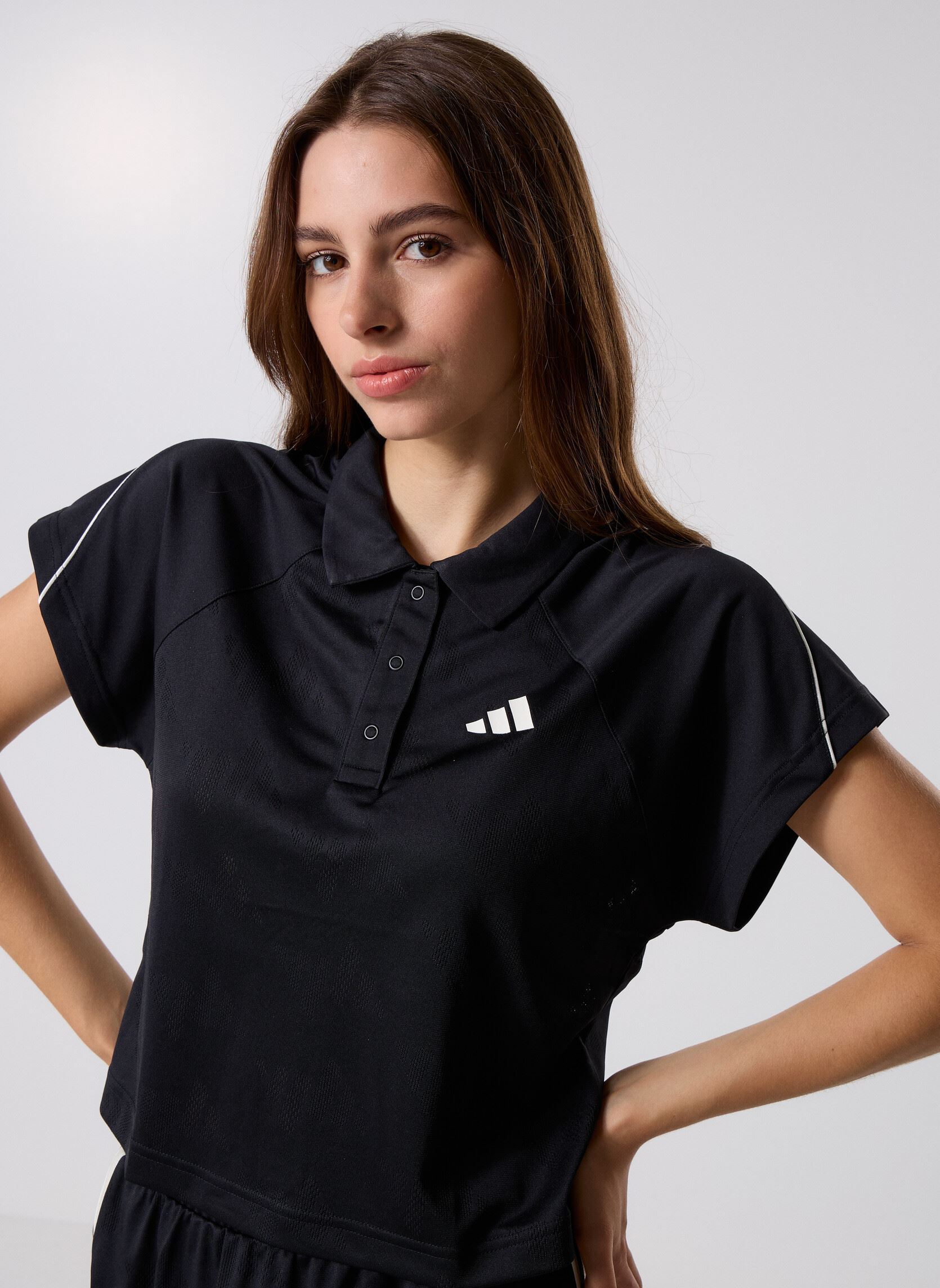 Polo a maniche corte W STA SEAS TOP donna nero adidas sportswear Polo a maniche corte W STA SEAS TOP donna nero Black/Owhite