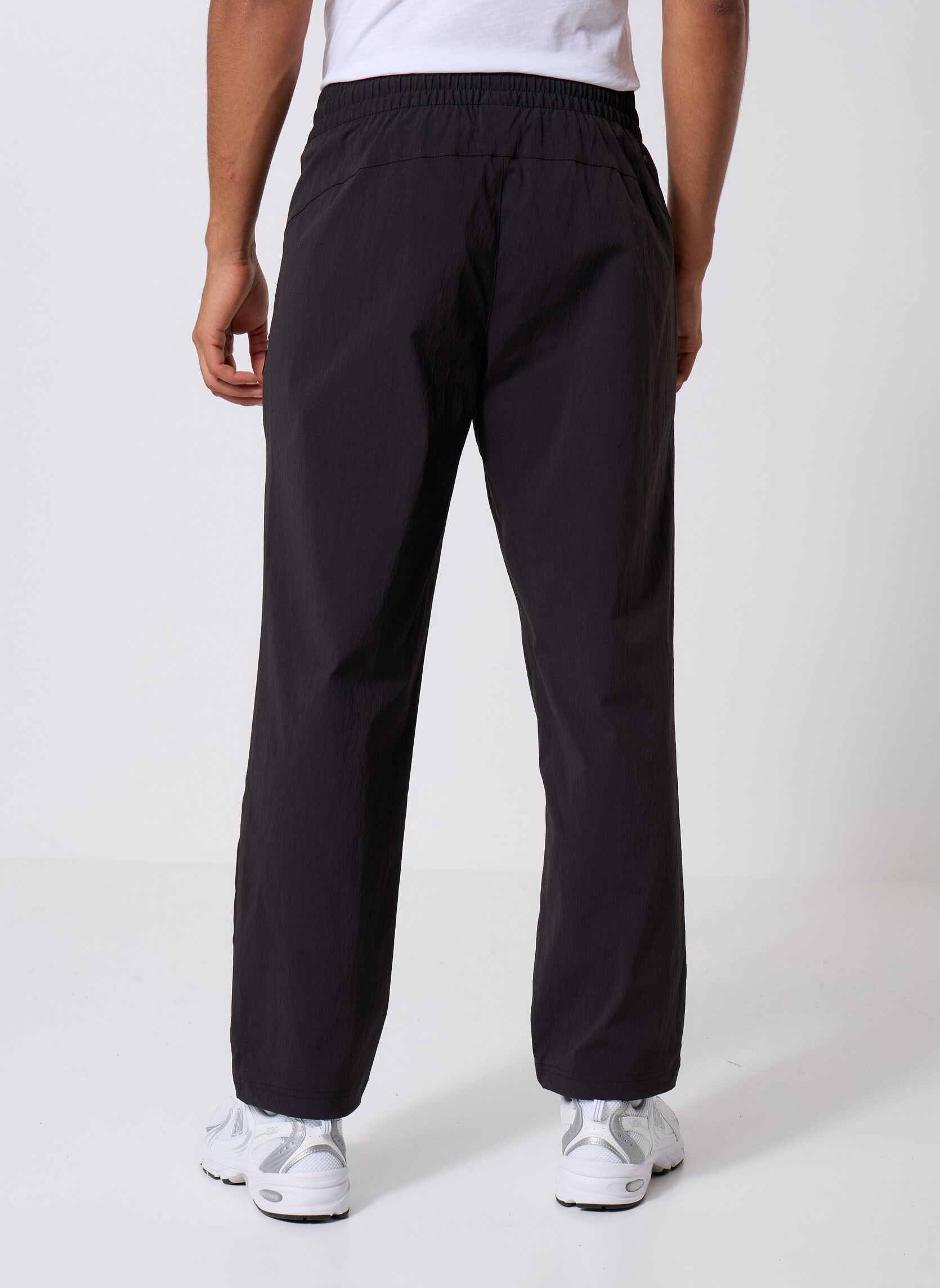 Pantalons chino Pumatech Relaxed Cargo Pants Wv Op homme noir Puma Pantalons chino Pumatech Relaxed Cargo Pants Wv Op homme noir Puma Black