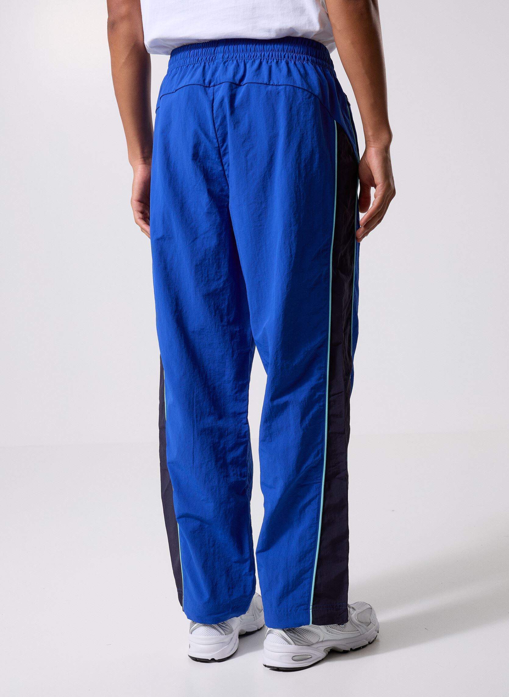 Joggings Om Ftblstatement Cellerator Pants homme bleu Puma Joggings Om Ftblstatement Cellerator Pants homme bleu VIVID BLUE-YELL
