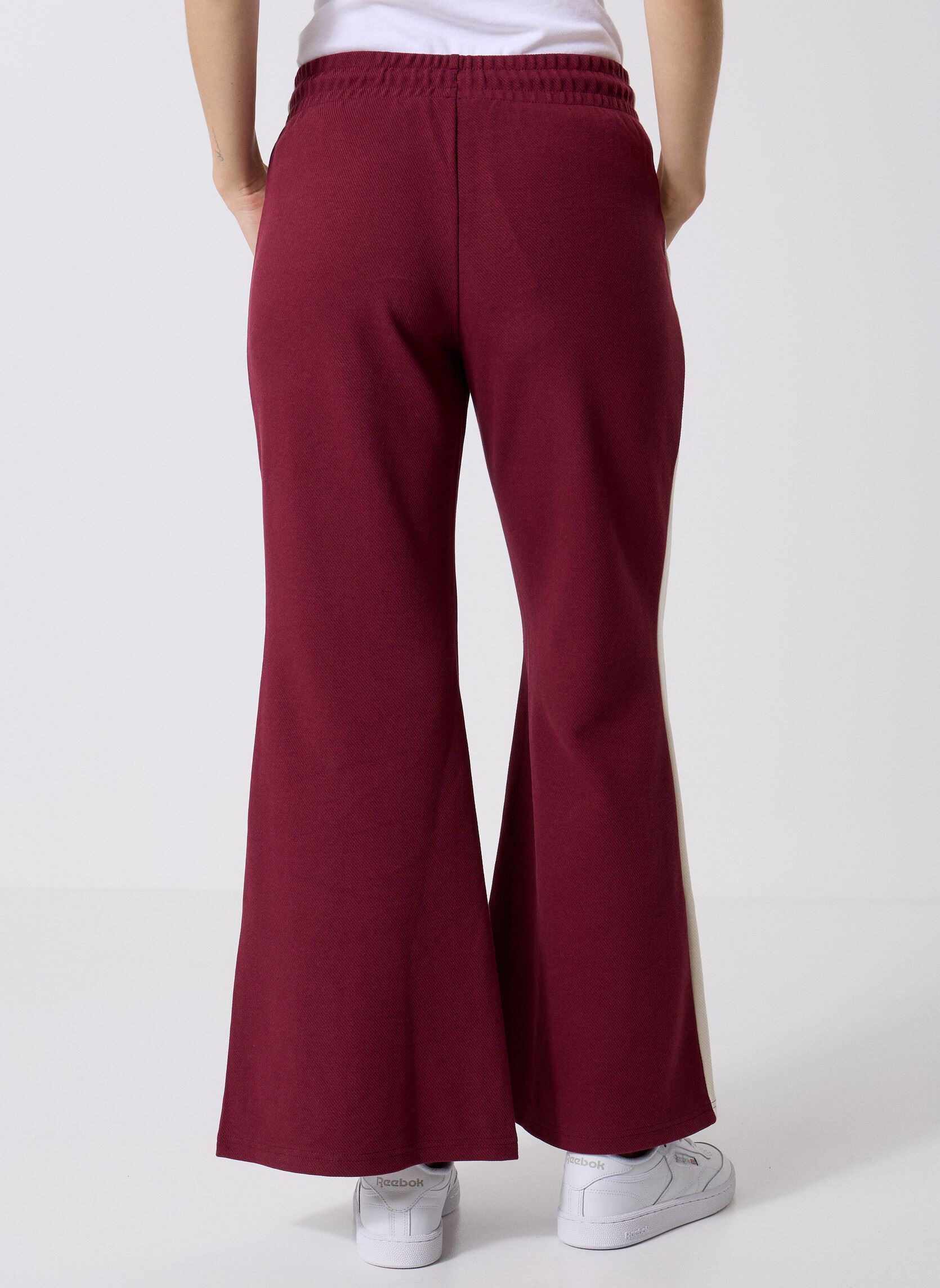 Trainingsbroeken T7 Flared Pants dames bordeaux Puma Trainingsbroeken T7 Flared Pants dames bordeaux Ruby Shimmer