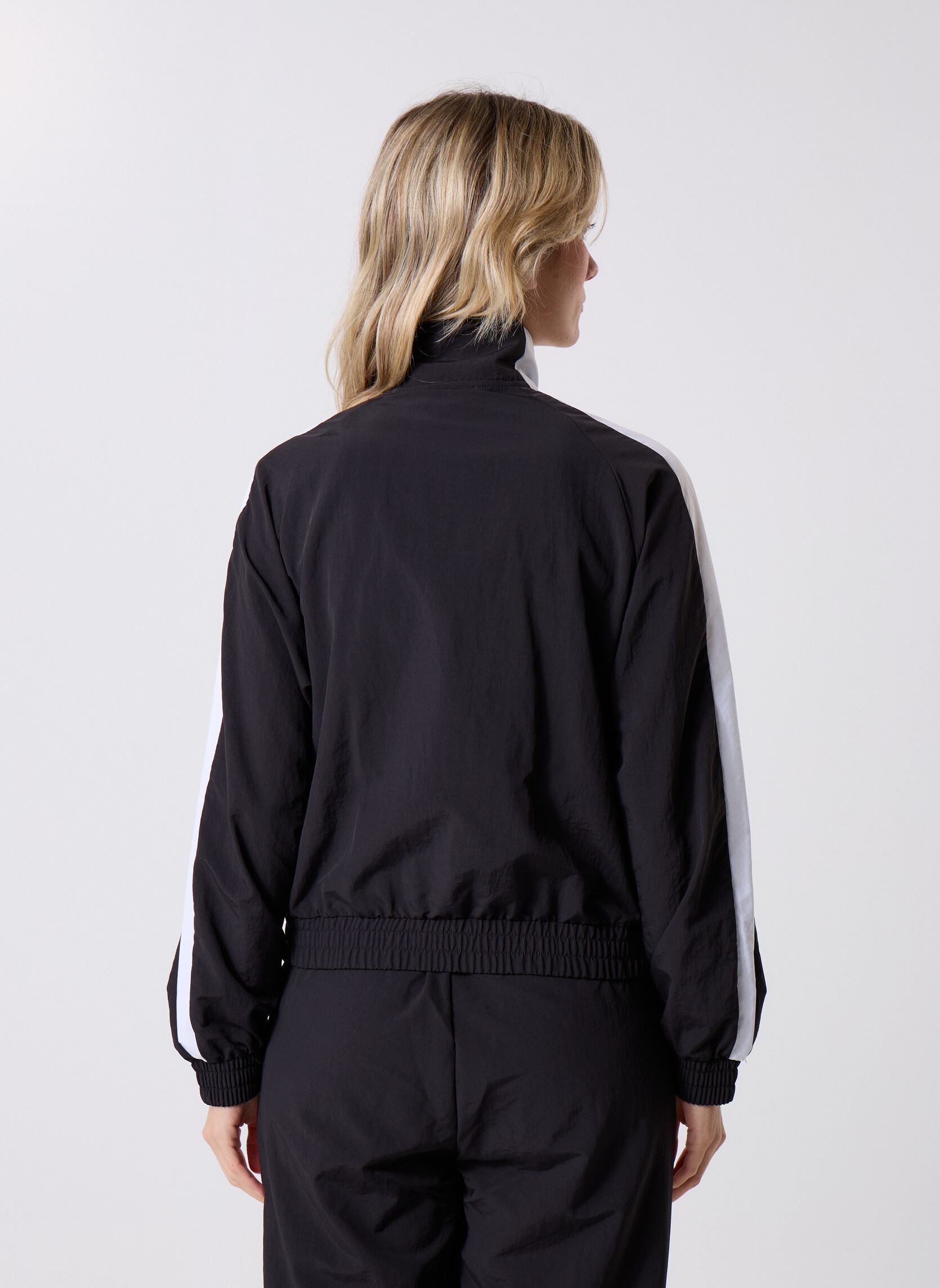 Vestes de survêtement T7 Relaxed Woven Track Jacket femme noir Puma Vestes de survêtement T7 Relaxed Woven Track Jacket femme noir Puma Black