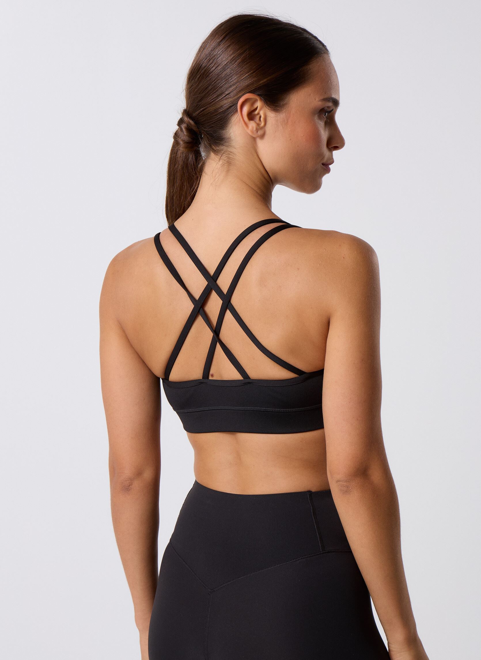 Brassières de Sport W Puma X Hyrox Move Strappy Bra femme noir Puma Brassières de Sport W Puma X Hyrox Move Strappy Bra femme noir Puma Black