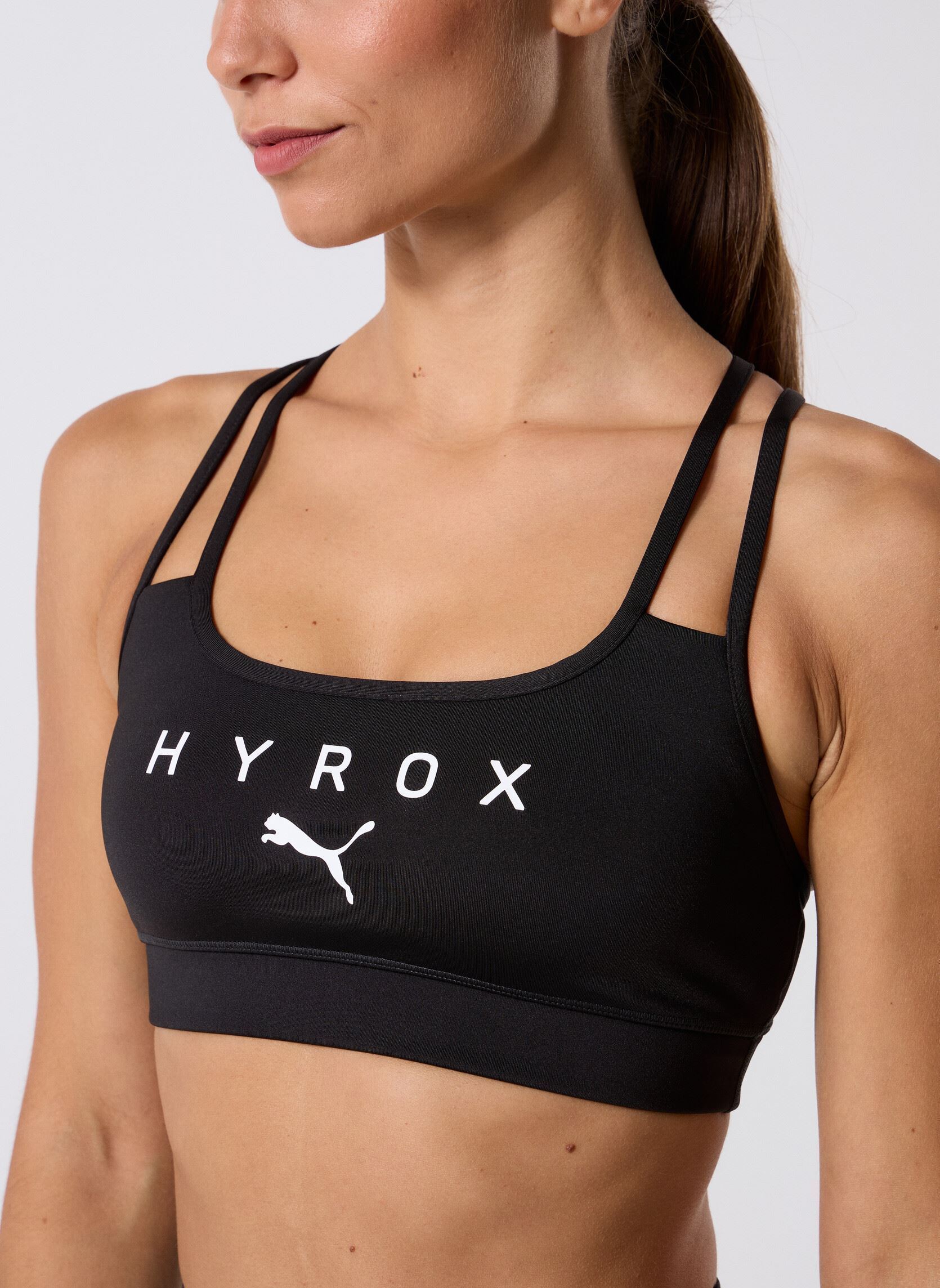 Brassières de Sport W Puma X Hyrox Move Strappy Bra femme noir Puma Brassières de Sport W Puma X Hyrox Move Strappy Bra femme noir Puma Black