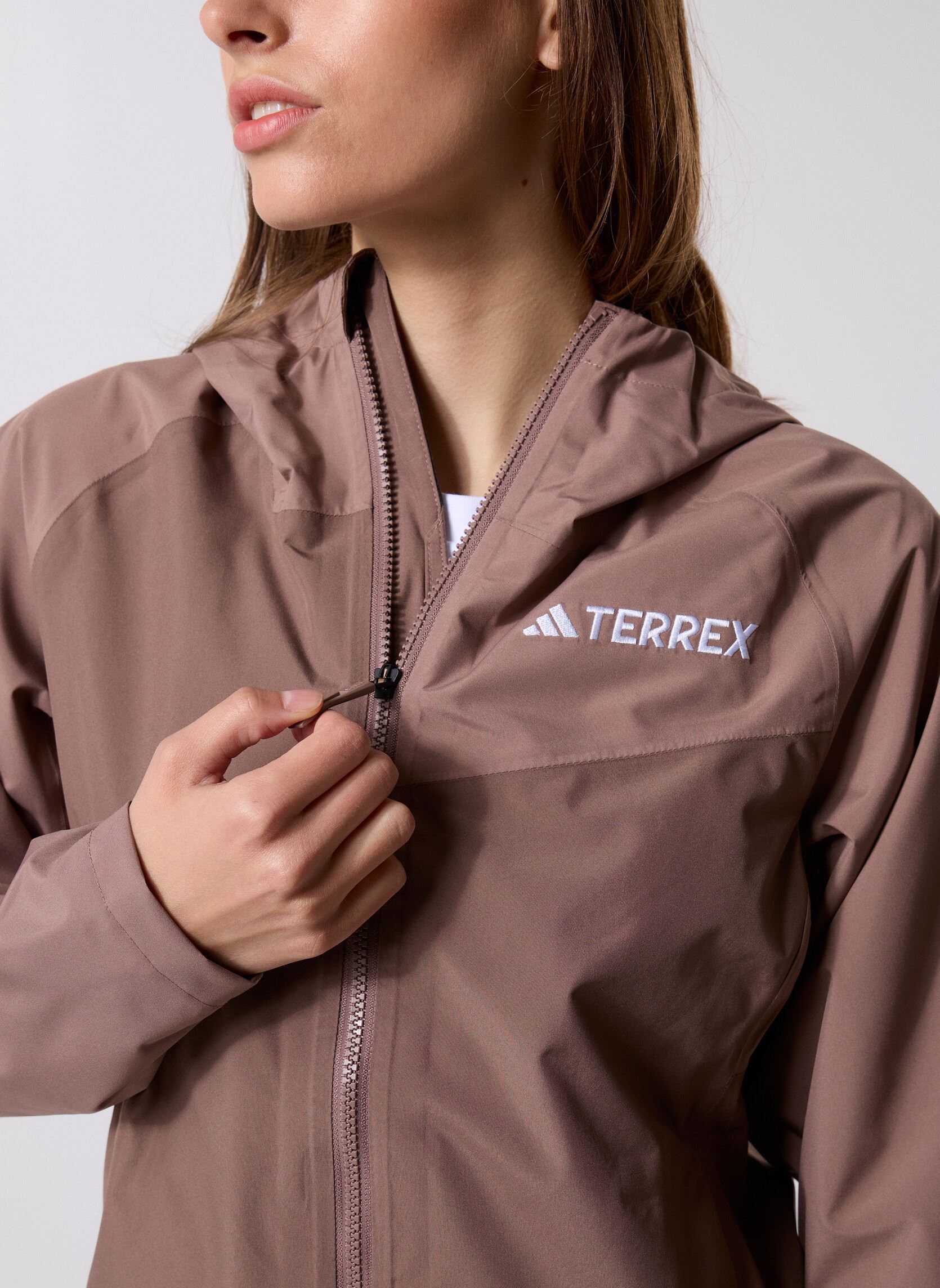 Vestes imperméable W Mt 2l Rain JK femme marron adidas performance Vestes imperméable W Mt 2l Rain JK femme marron Earstr/Trabrn