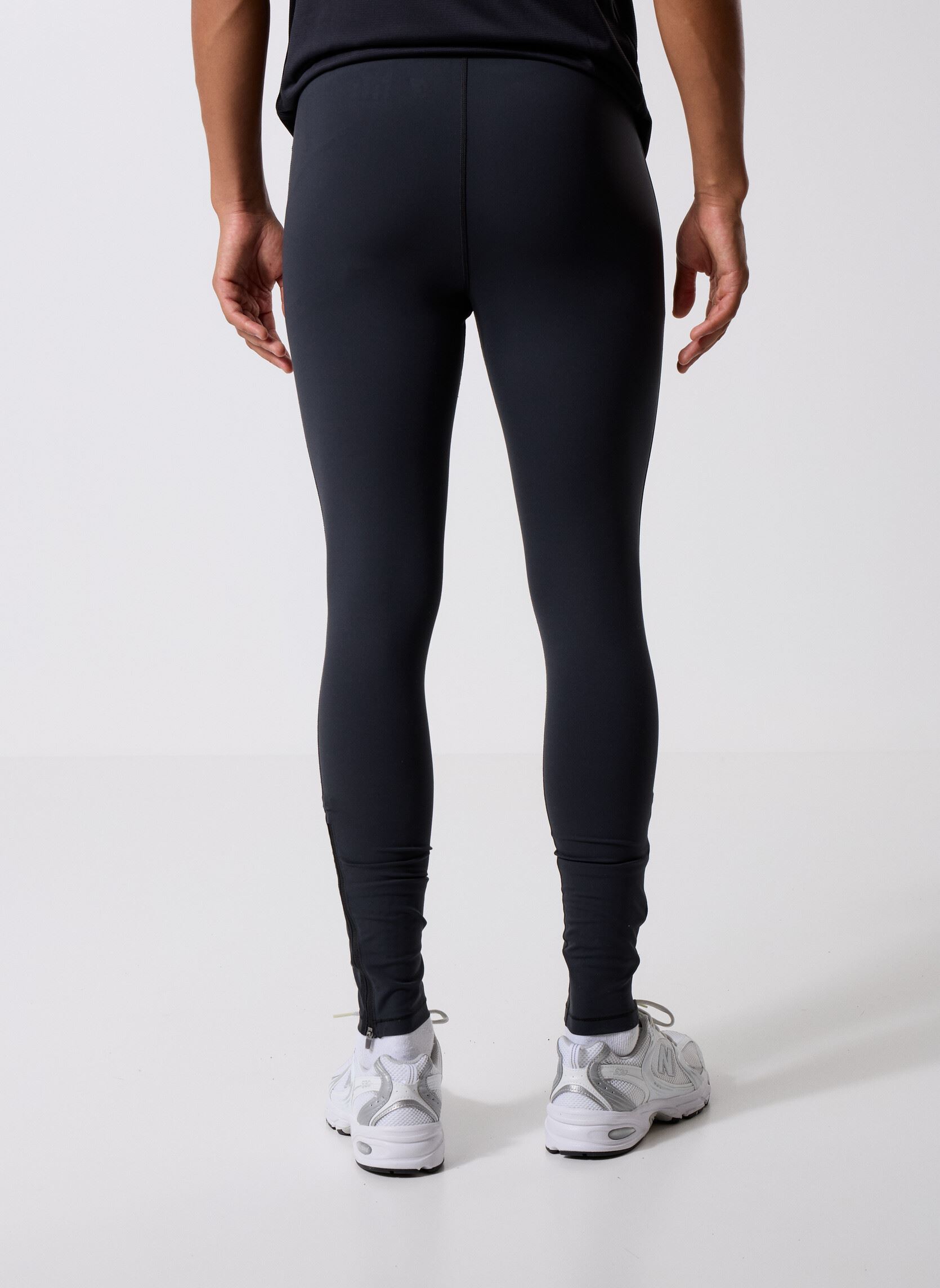 Joggings NB Sleek Tight homme noir New Balance Joggings NB Sleek Tight homme noir Black