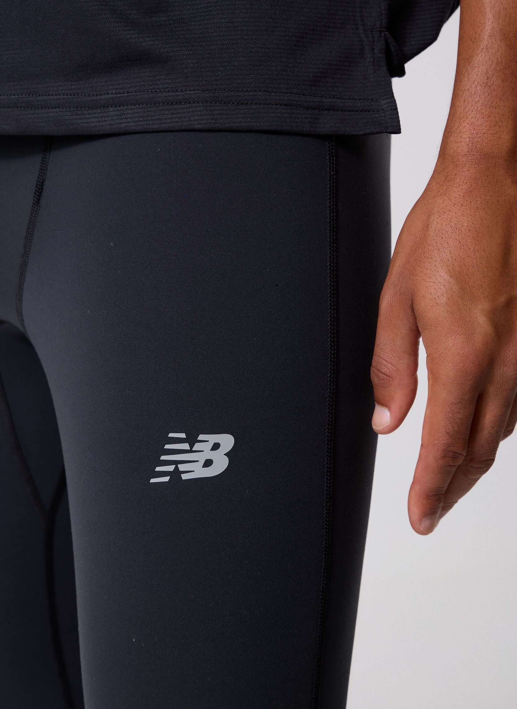 Joggings NB Sleek Tight homme noir New Balance Joggings NB Sleek Tight homme noir Black