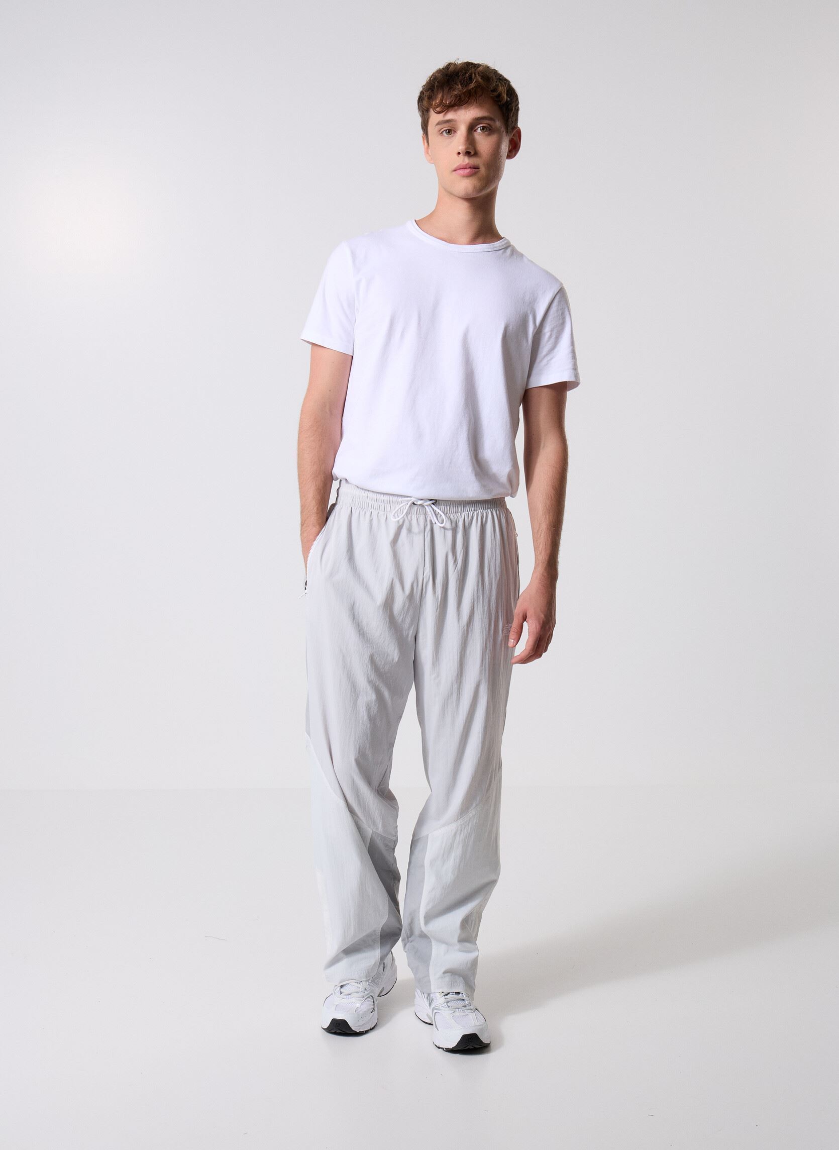 Joggings Achieve Pant homme gris New Balance Joggings Achieve Pant homme gris Grey Matter