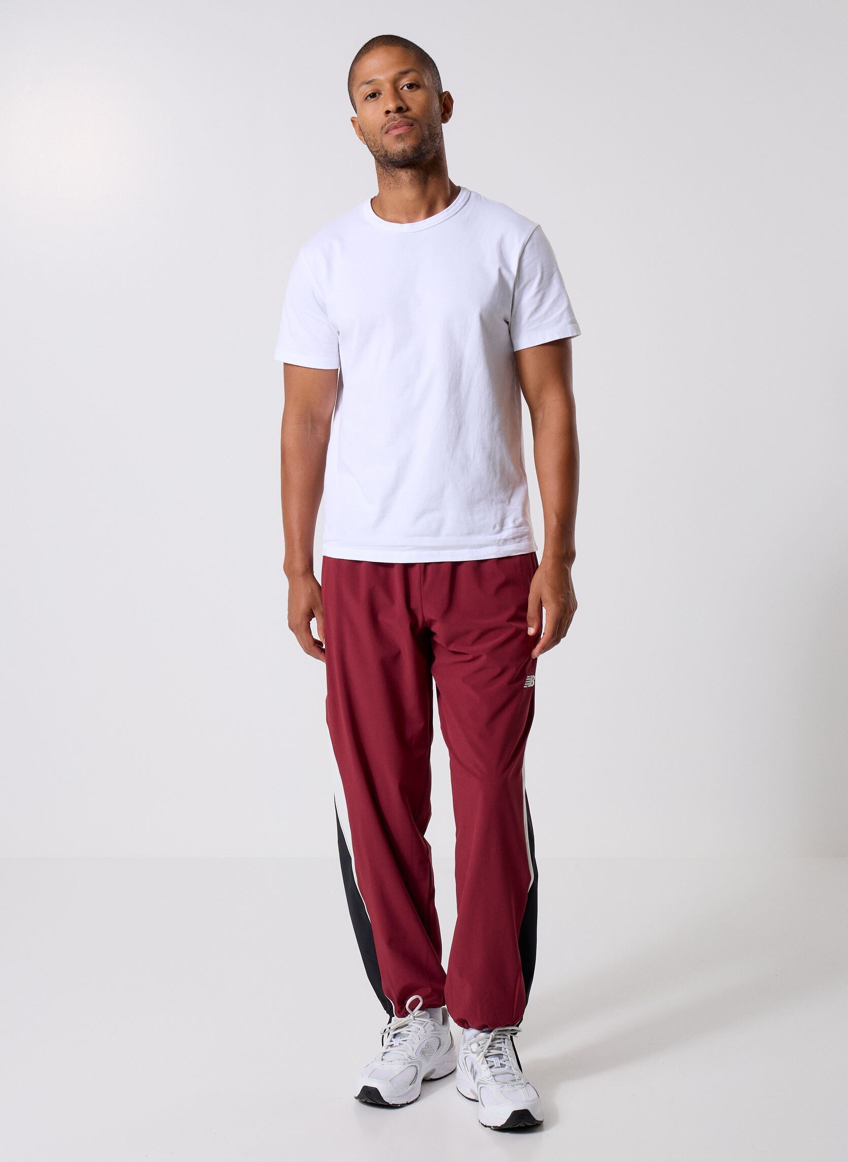 Joggings In Game Woven Track Pant homme bordeaux New Balance Joggings In Game Woven Track Pant homme bordeaux MONARCH BURGUNDY