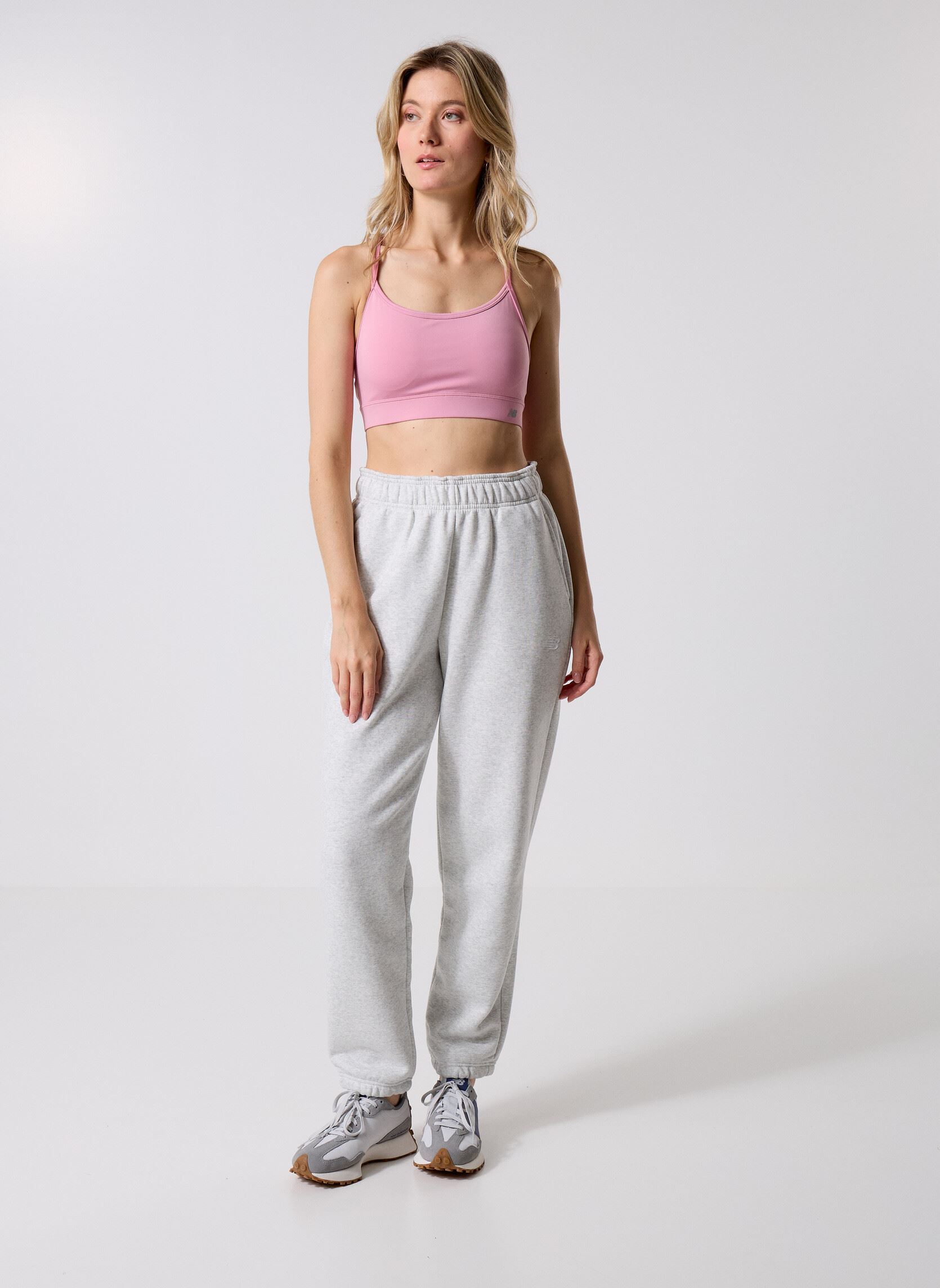Bas de jogging Sport Essentials Fleece Jogger Women femme gris New Balance Bas de jogging Sport Essentials Fleece Jogger Women femme gris ASH HEATHER