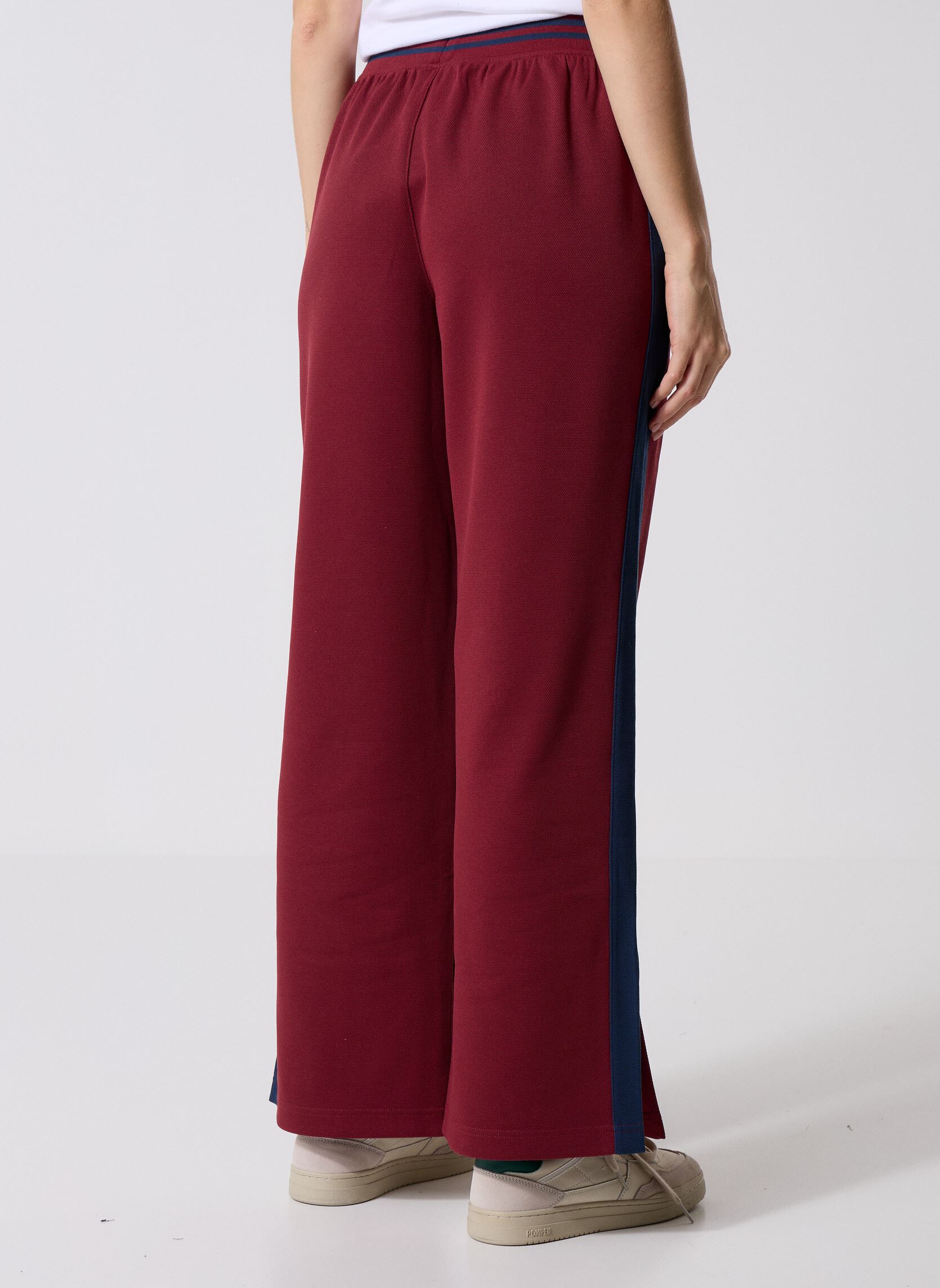 Trainingsbroeken Post Season Pique Track Pant dames bordeaux New Balance Trainingsbroeken Post Season Pique Track Pant dames bordeaux Monarch Burgundy