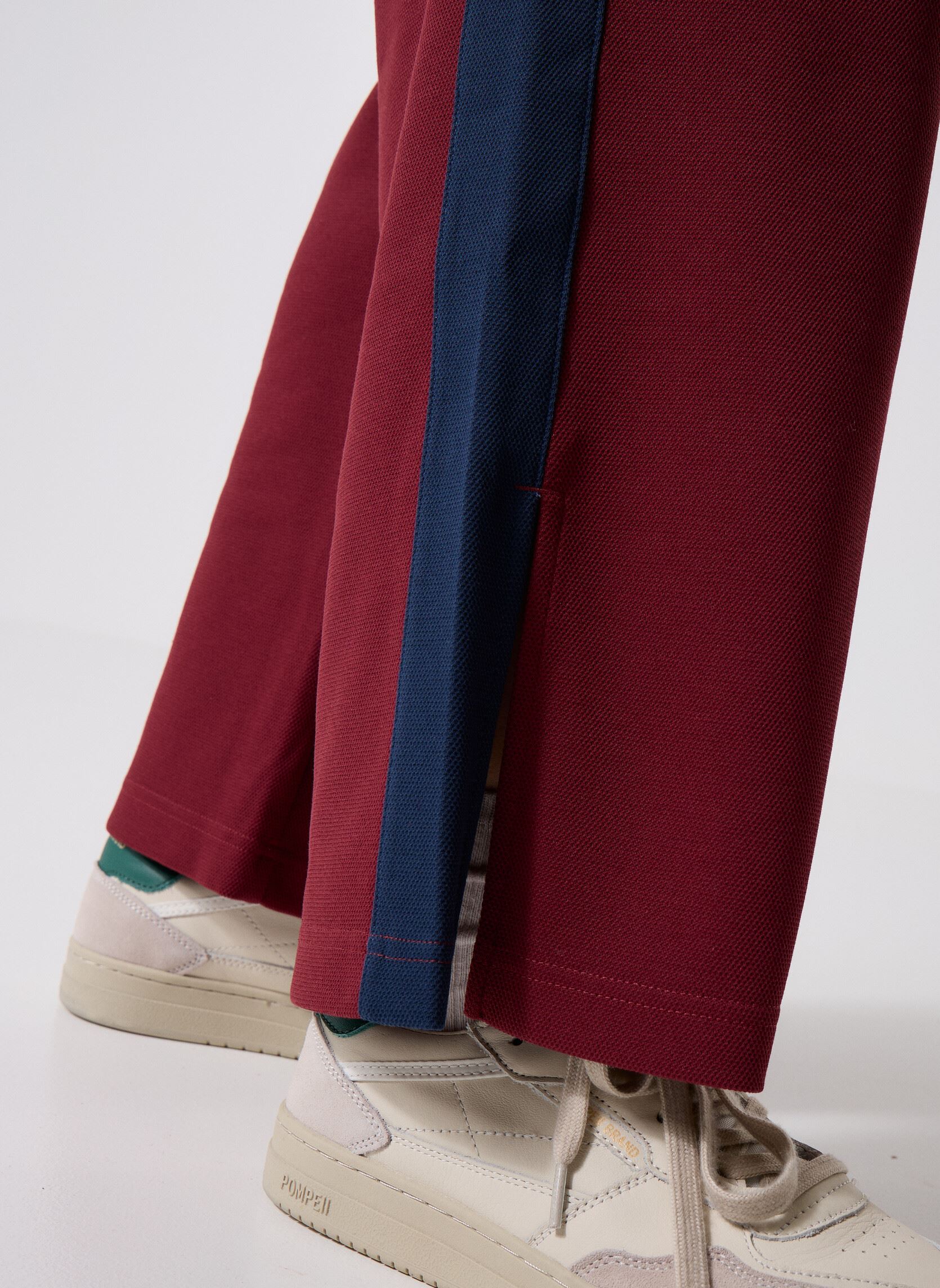 Trainingsbroeken Post Season Pique Track Pant dames bordeaux New Balance Trainingsbroeken Post Season Pique Track Pant dames bordeaux Monarch Burgundy