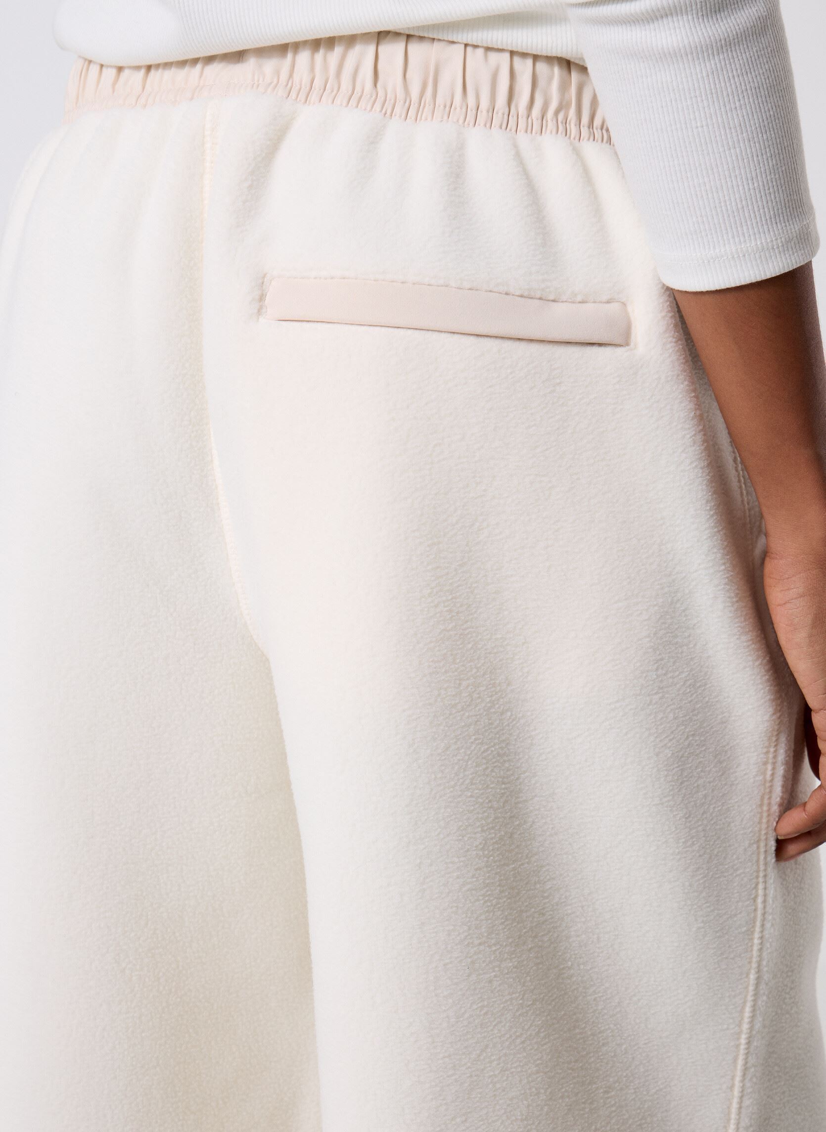 Bas de jogging High Pile Fleece Pant femme blanc New Balance Bas de jogging High Pile Fleece Pant femme blanc Permafrost