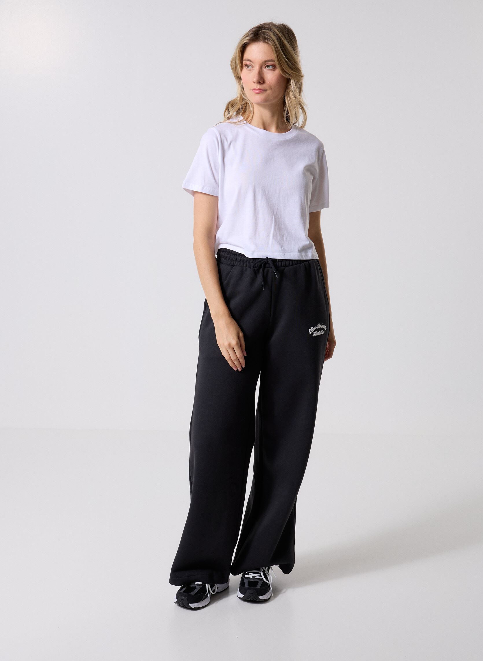 Bas de jogging Linear Heritage Fleece Wide Leg Pant femme noir New Balance Bas de jogging Linear Heritage Fleece Wide Leg Pant femme noir Black