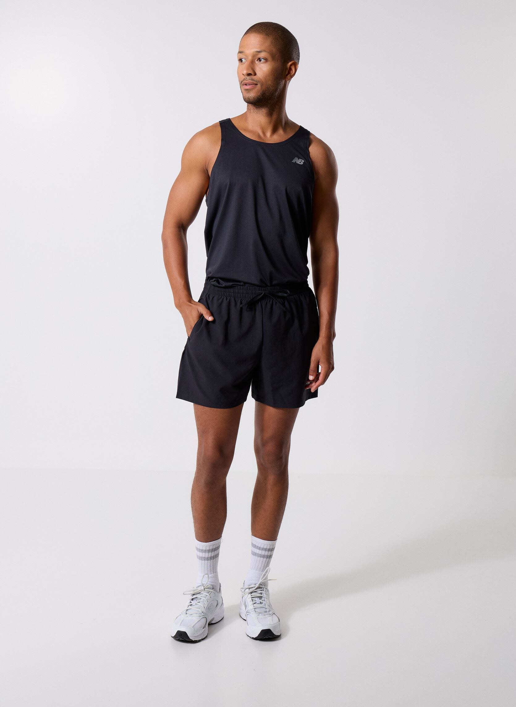 Shorts de sport Sport Essentials Short 5 homme noir New Balance Shorts de sport Sport Essentials Short 5 homme noir Black