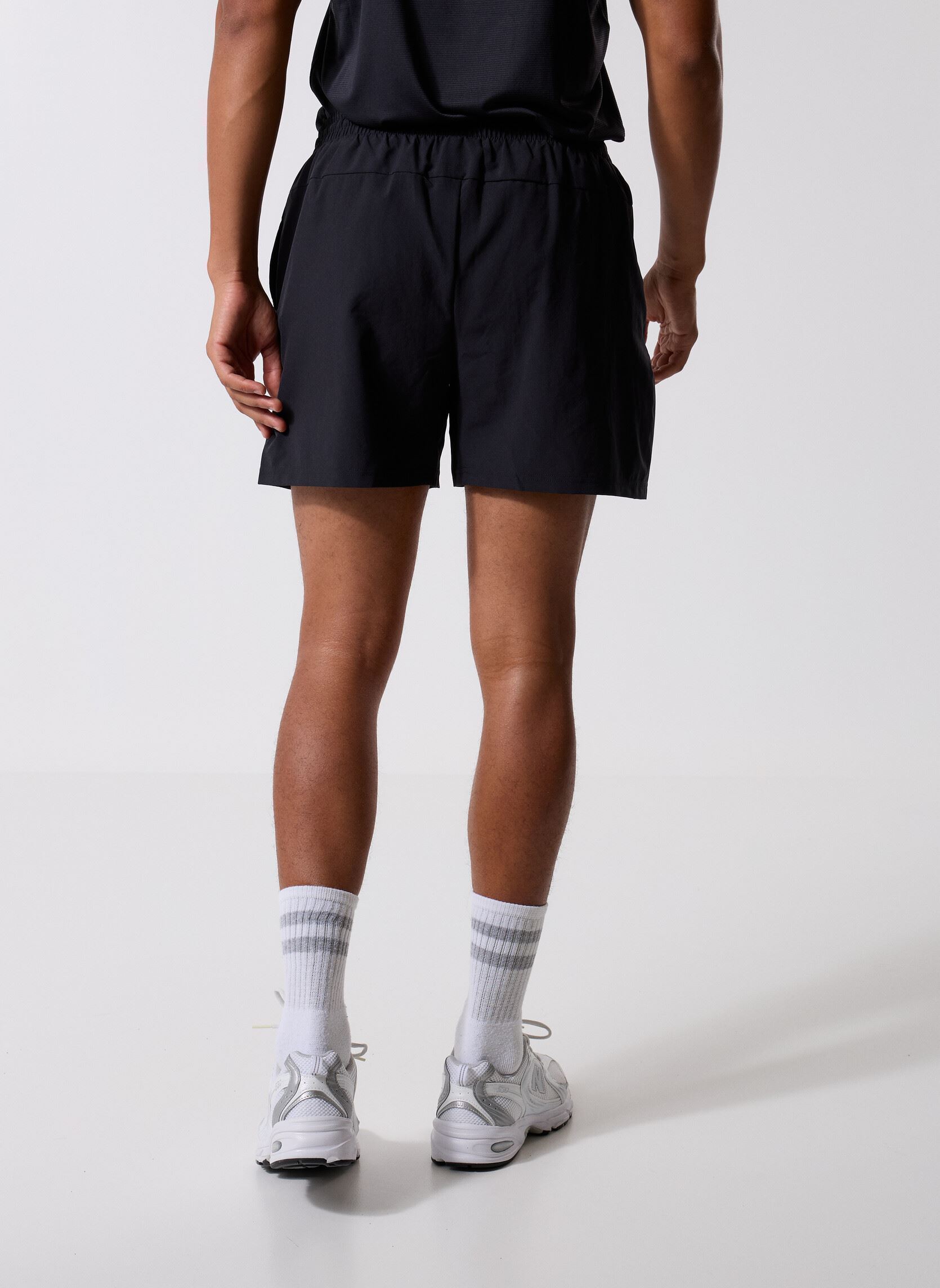 Shorts de sport Sport Essentials Short 5 homme noir New Balance Shorts de sport Sport Essentials Short 5 homme noir Black