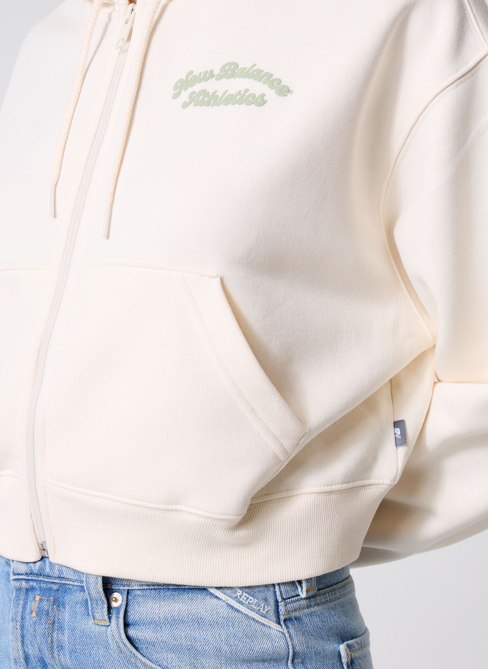 Sweats zippés Linear Heritage Fleece Full Zip femme blanc New Balance Sweats zippés Linear Heritage Fleece Full Zip femme blanc Permafrost