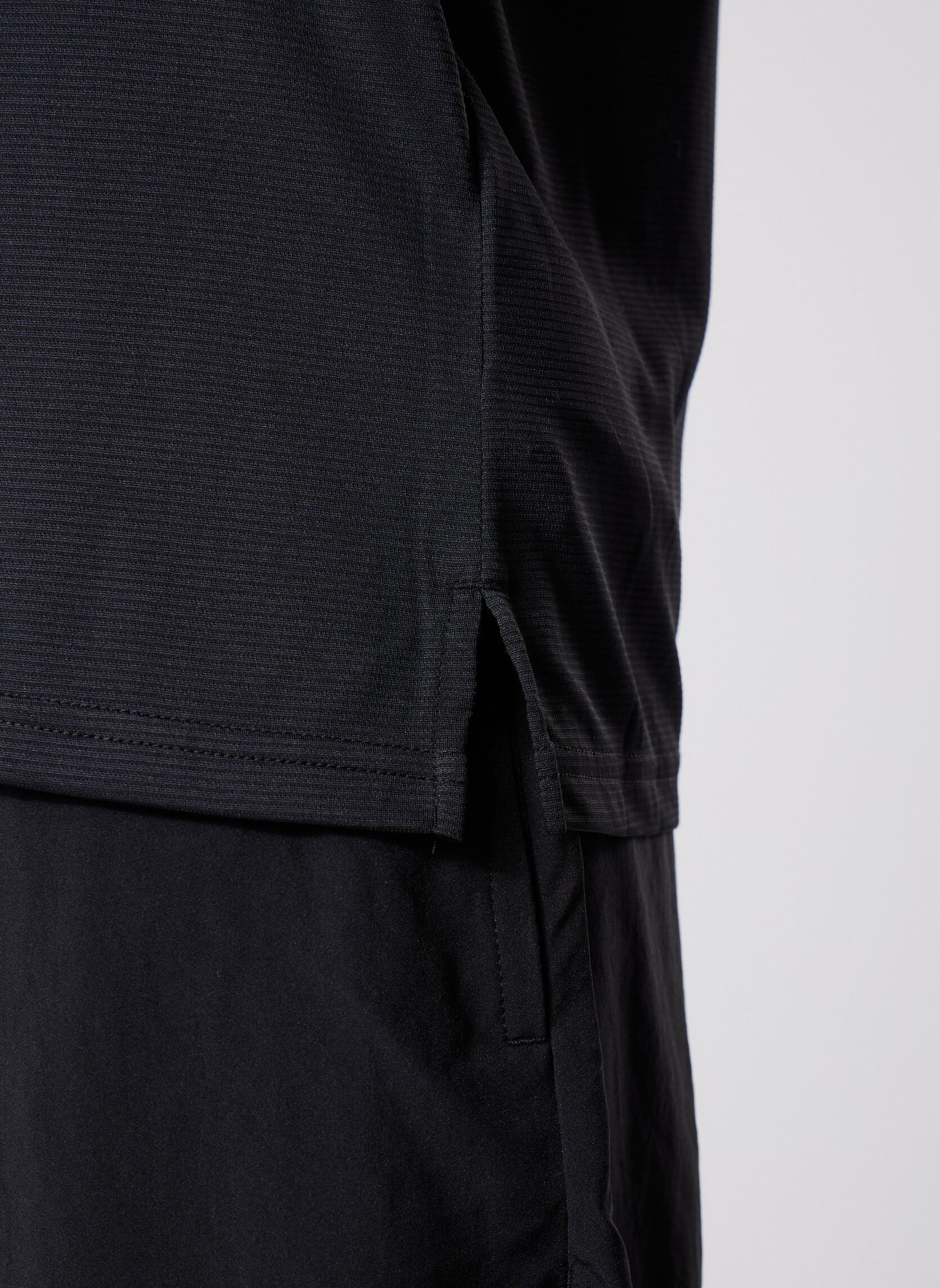 Débardeurs Sport Essentials Singlet homme noir New Balance Débardeurs Sport Essentials Singlet homme noir Black