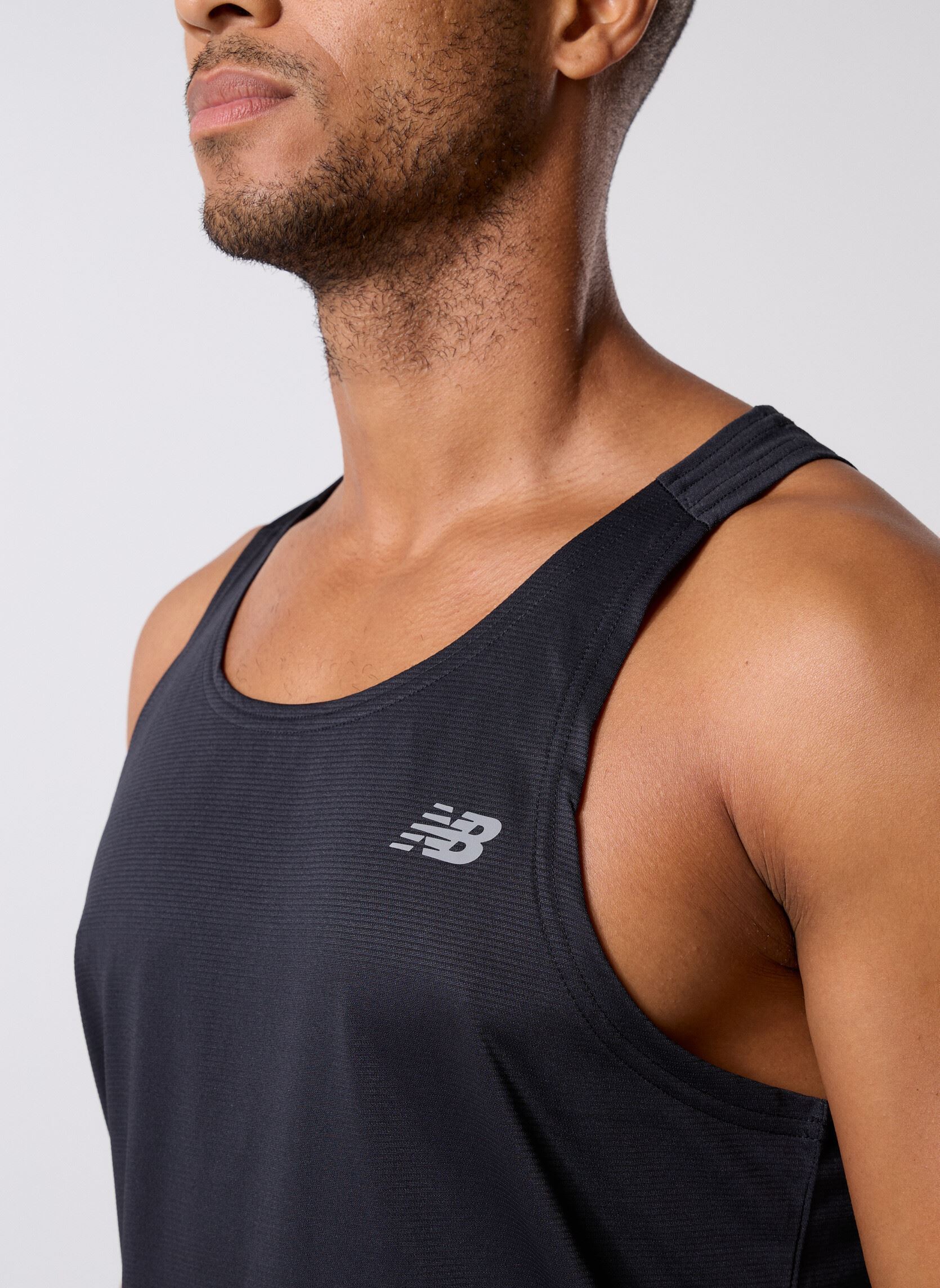 Débardeurs Sport Essentials Singlet homme noir New Balance Débardeurs Sport Essentials Singlet homme noir Black