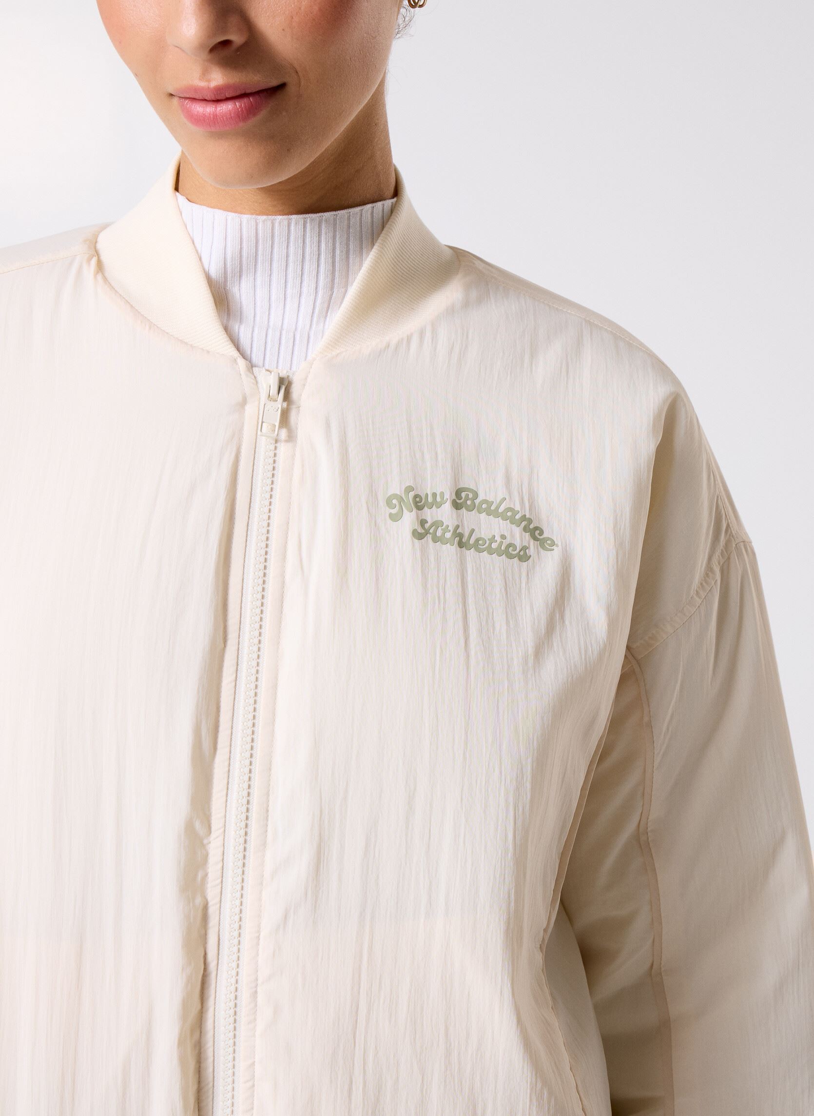 Blousons Linear Heritage Woven Bomber Jacket femme blanc New Balance Blousons Linear Heritage Woven Bomber Jacket femme blanc Permafrost