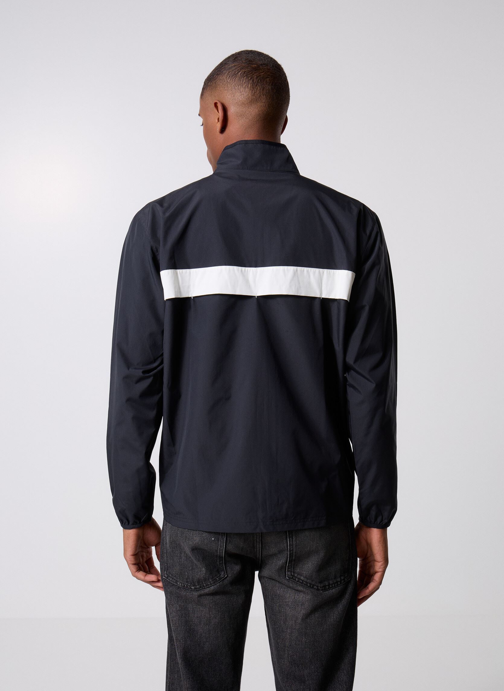 Windbreaker / Windjacken Sport Essentials Jacket herren schwarz New Balance Windbreaker / Windjacken Sport Essentials Jacket herren schwarz Black multi