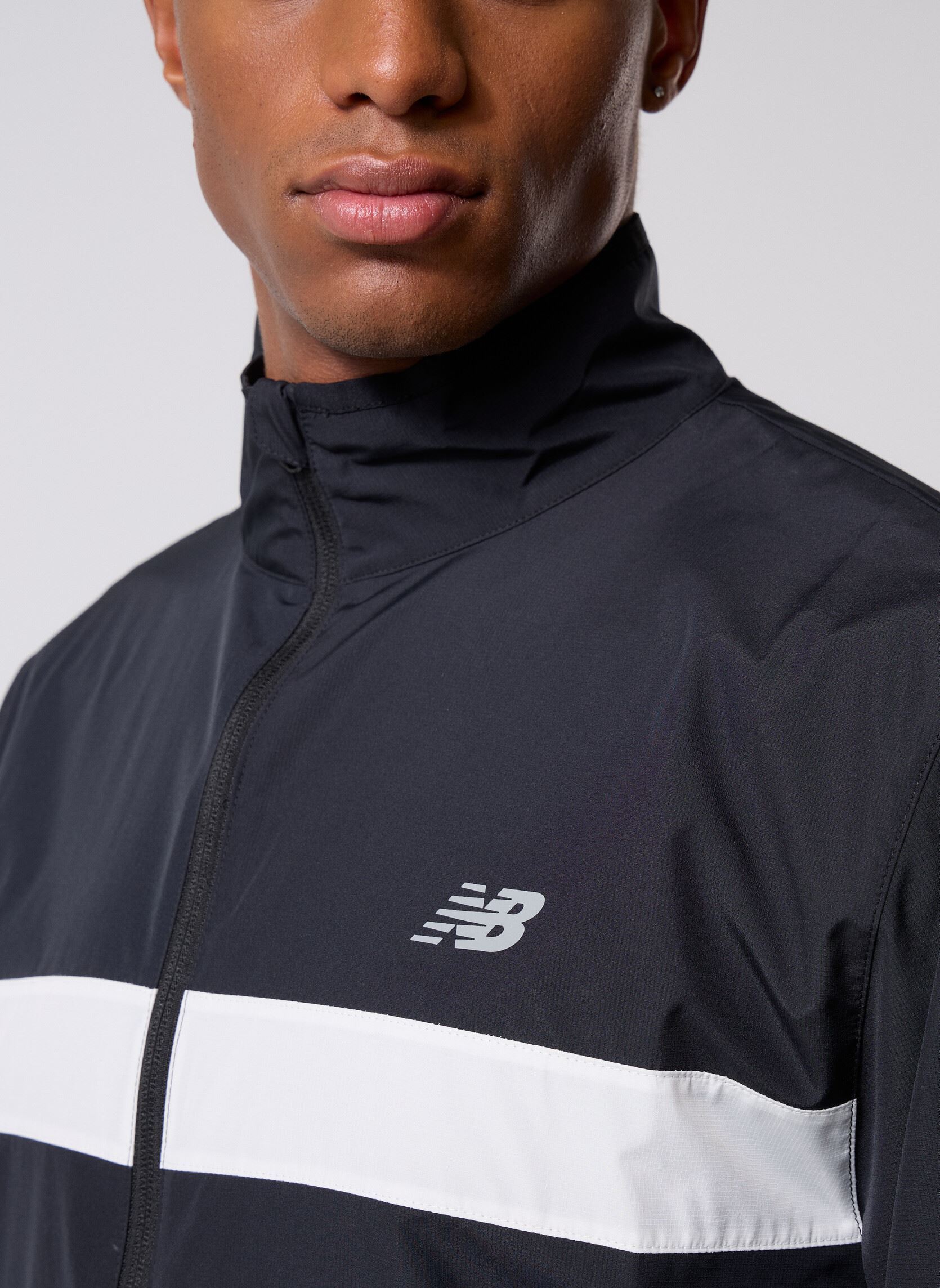Windbreaker / Windjacken Sport Essentials Jacket herren schwarz New Balance Windbreaker / Windjacken Sport Essentials Jacket herren schwarz Black multi