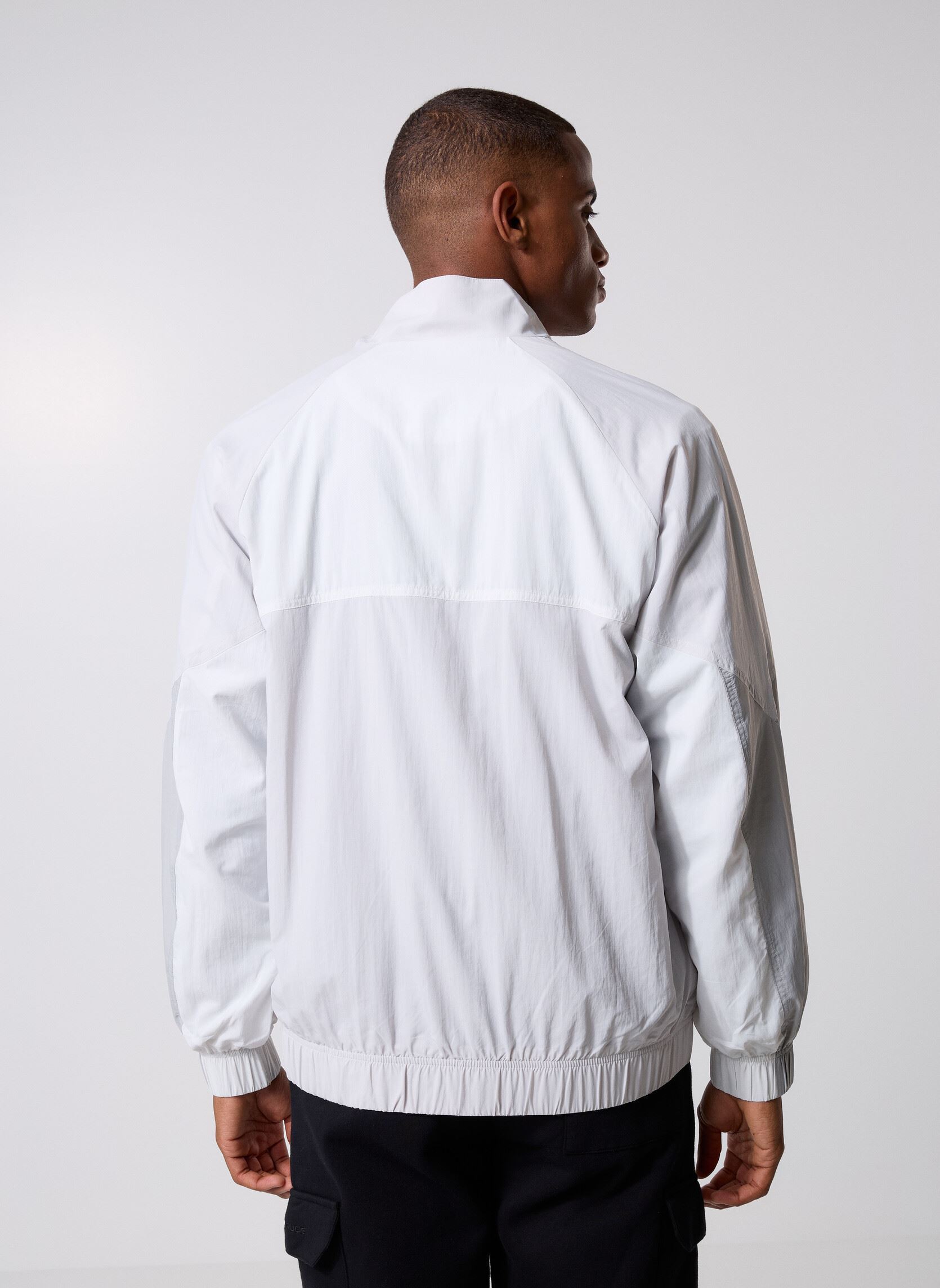 Vestes coupe-vents Achieve Jacket homme gris New Balance Vestes coupe-vents Achieve Jacket homme gris Reflection