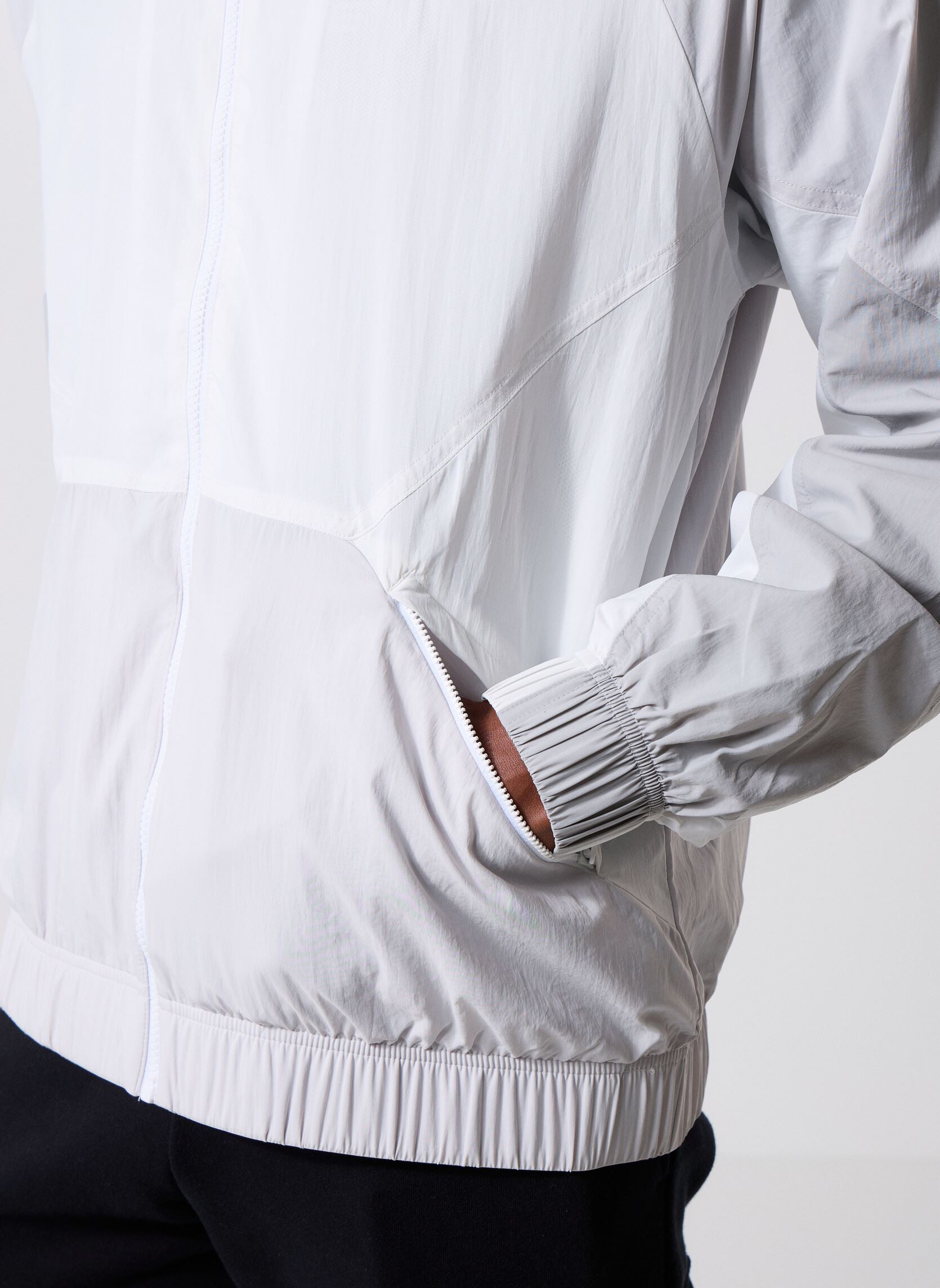 Vestes coupe-vents Achieve Jacket homme gris New Balance Vestes coupe-vents Achieve Jacket homme gris Reflection