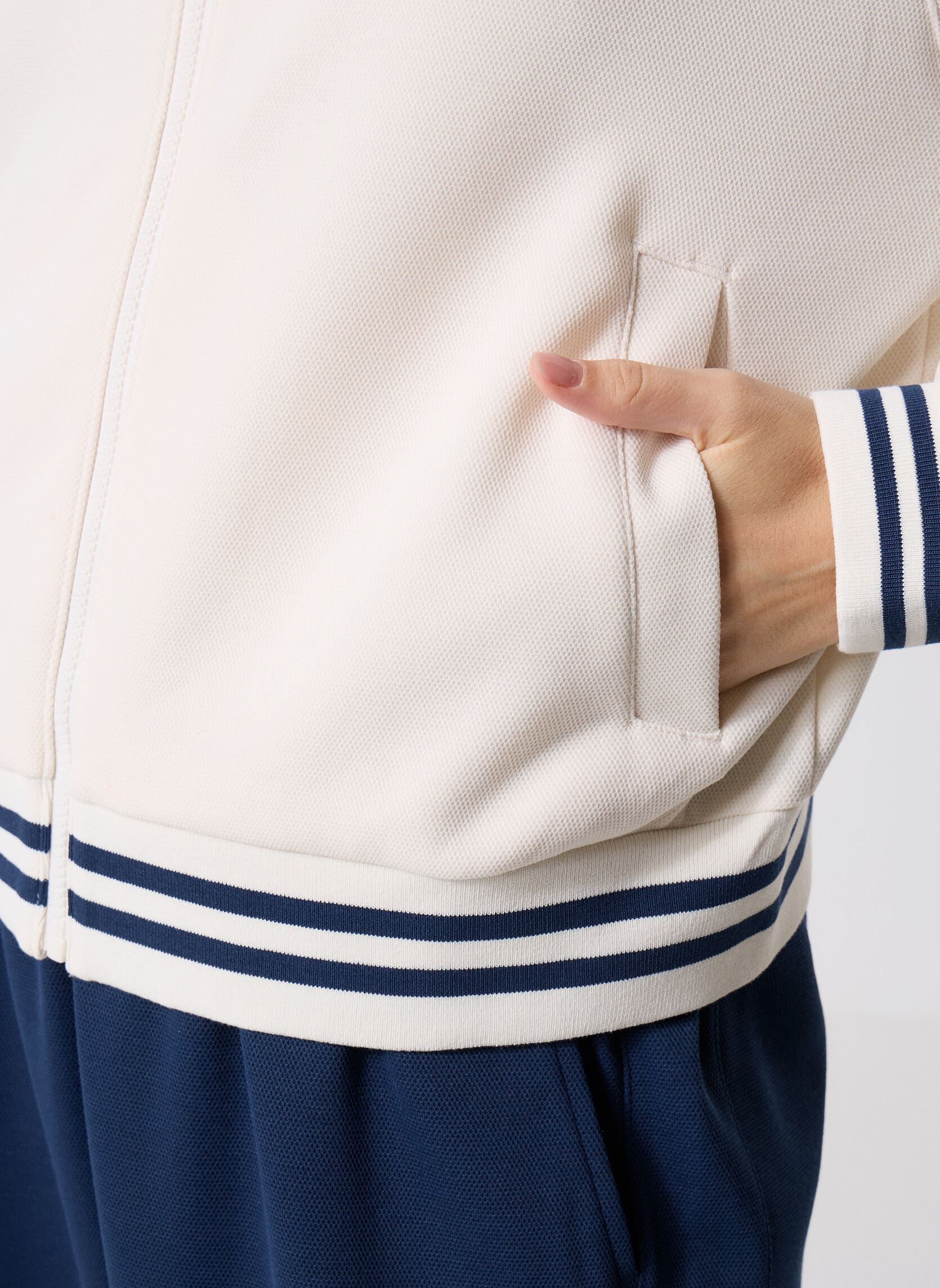 Trainingsvest Post Season Pique Track Jacket dames wit New Balance Trainingsvest Post Season Pique Track Jacket dames wit Permafrost