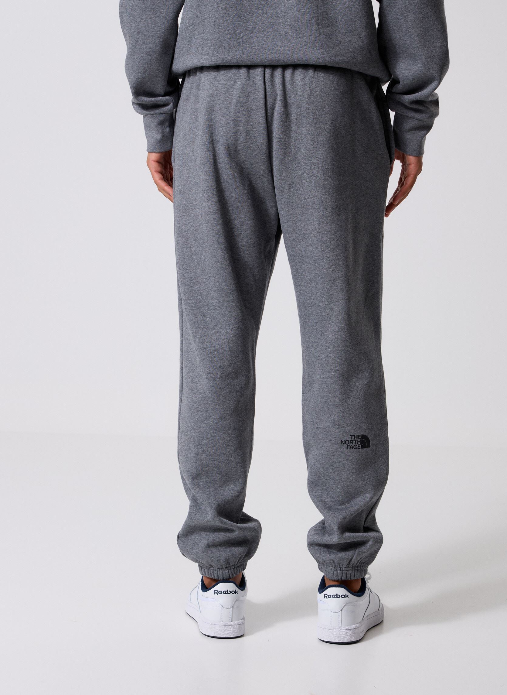 Joggingbroeken M Simple Dome Regular Tapered Jogger heren grijs The North Face Joggingbroeken M Simple Dome Regular Tapered Jogger heren grijs TNF MEDIUM GREY HEATHER