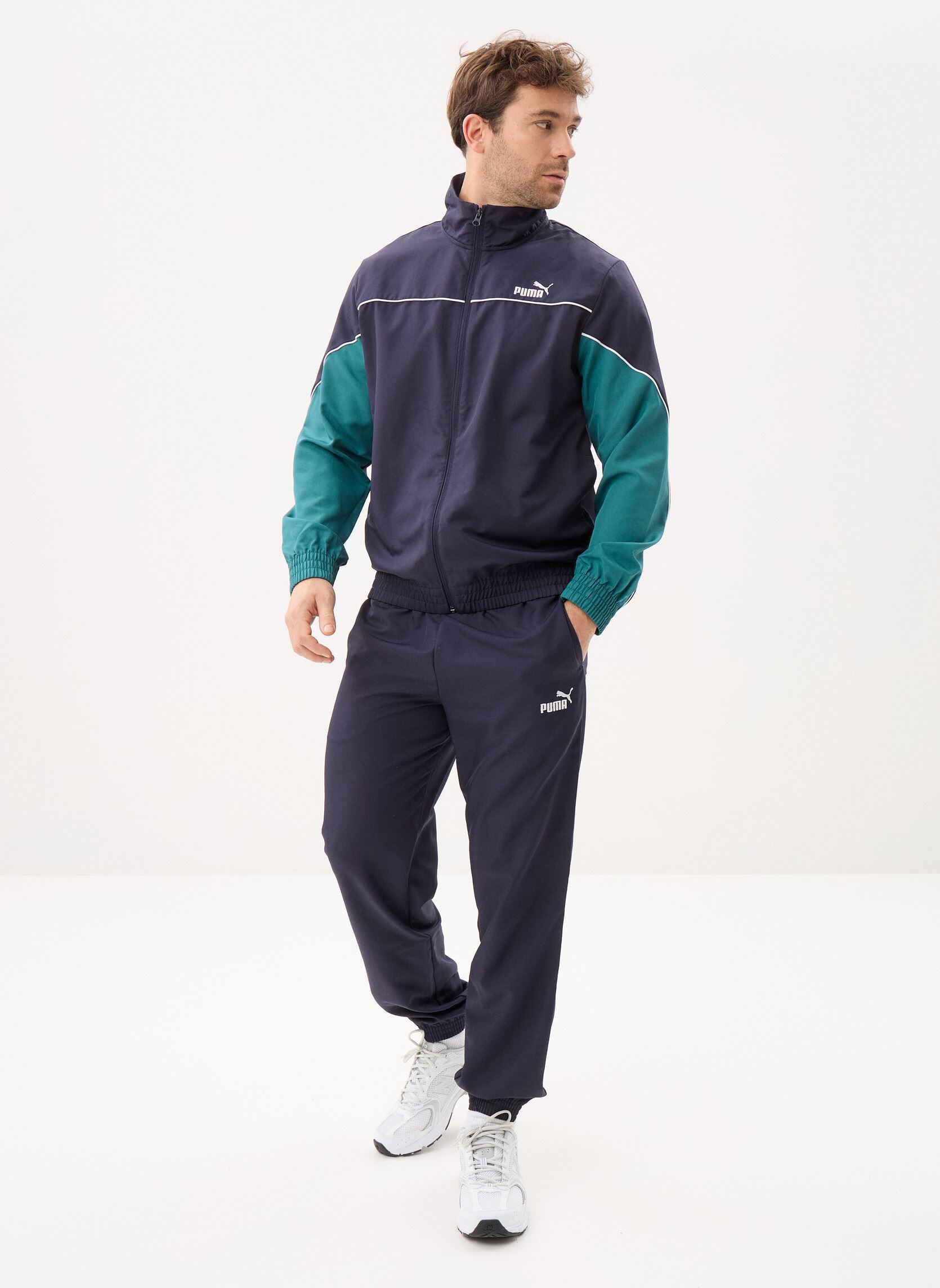 Trainingspakken Woven Colorblock Suit heren blauw Puma Trainingspakken Woven Colorblock Suit heren blauw NEW NAVY