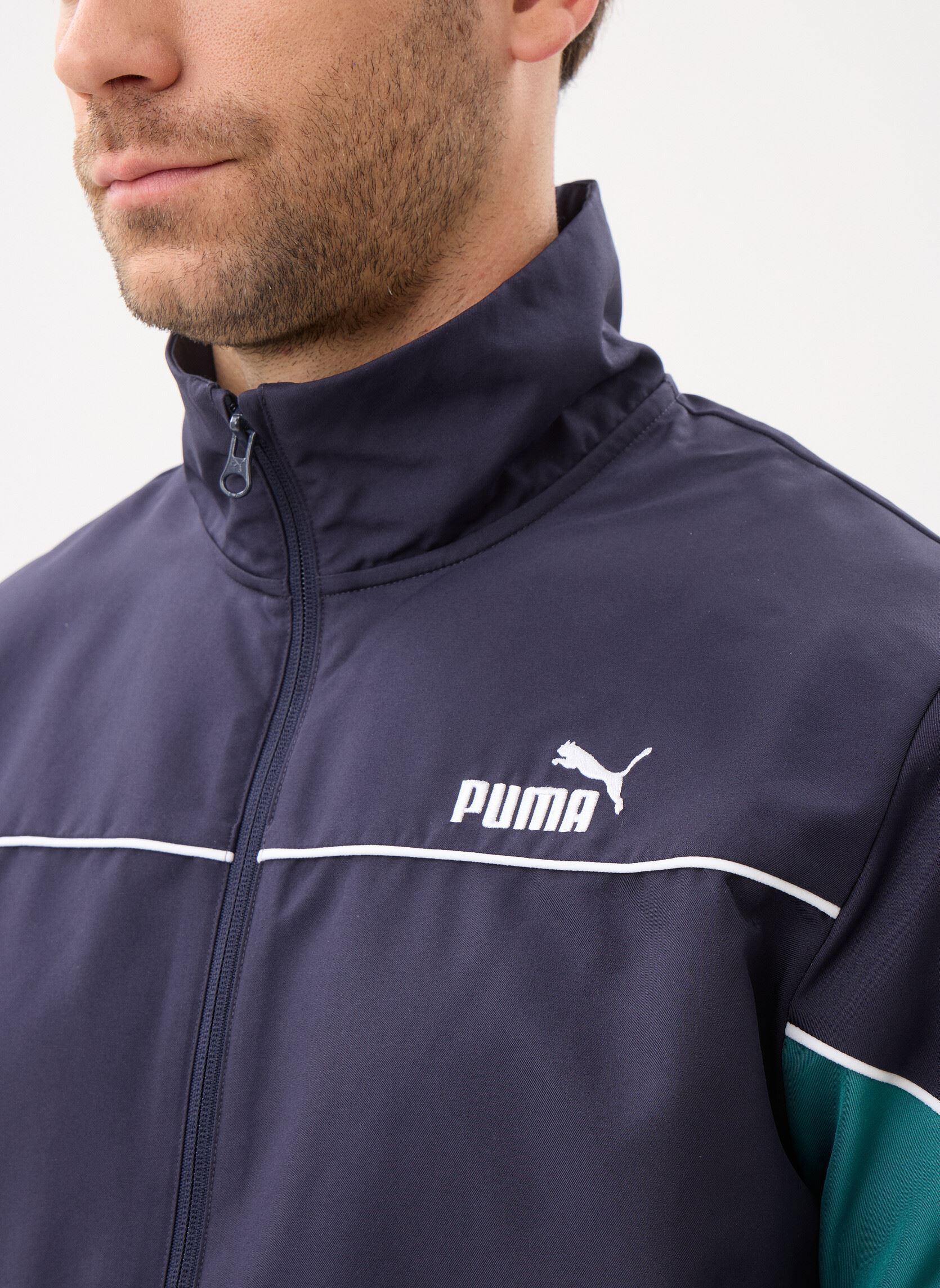 Trainingspakken Woven Colorblock Suit heren blauw Puma Trainingspakken Woven Colorblock Suit heren blauw NEW NAVY