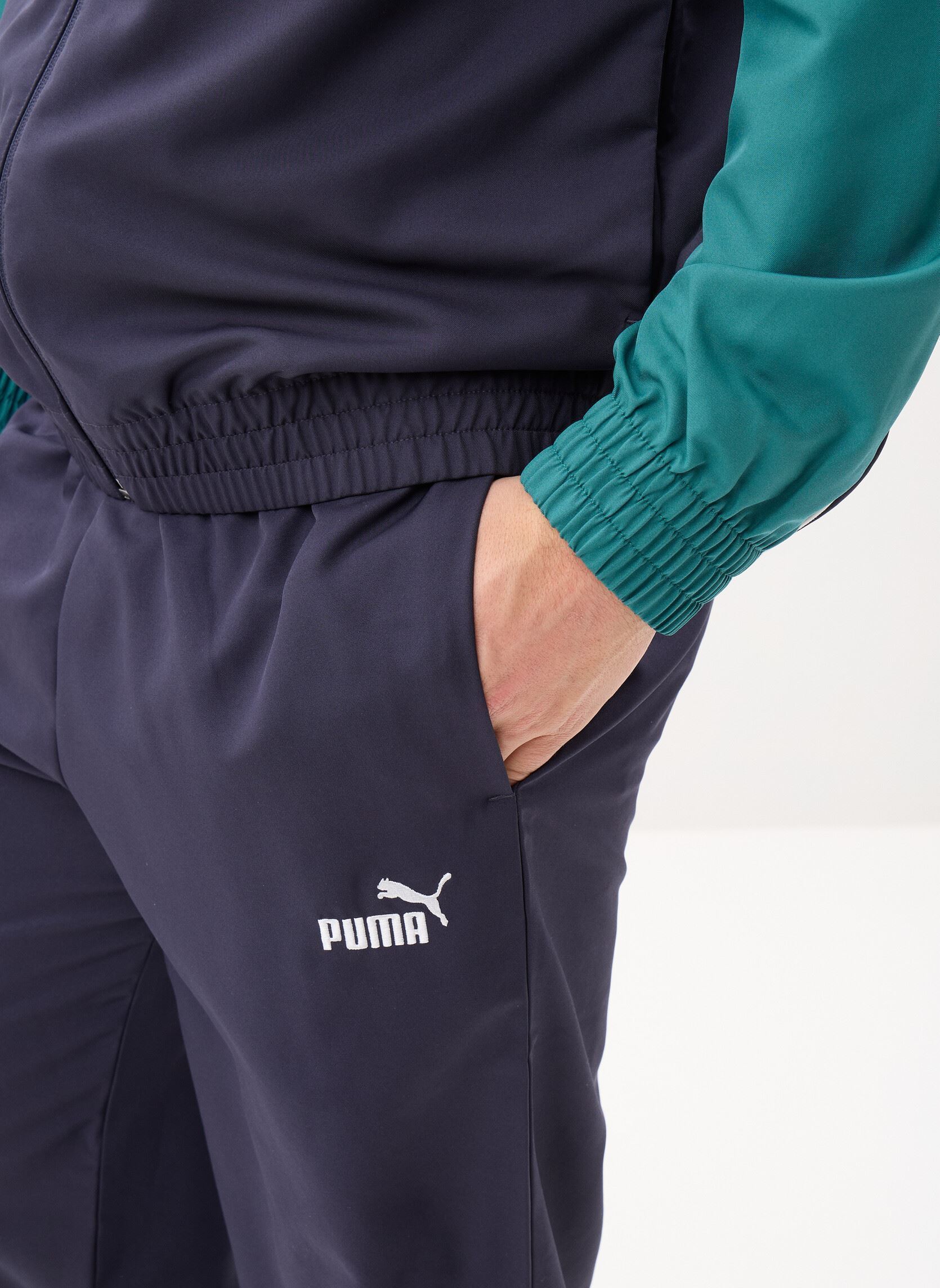 Trainingspakken Woven Colorblock Suit heren blauw Puma Trainingspakken Woven Colorblock Suit heren blauw NEW NAVY