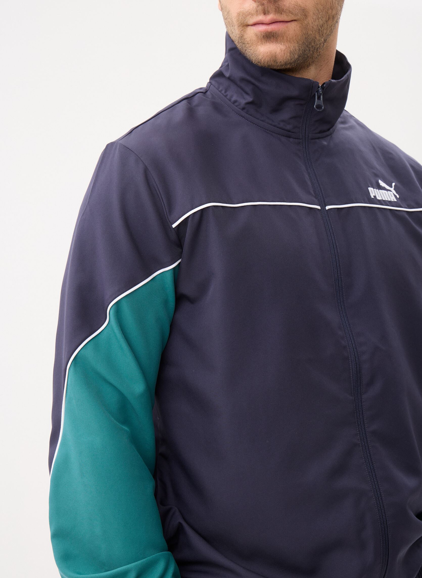 Trainingspakken Woven Colorblock Suit heren blauw Puma Trainingspakken Woven Colorblock Suit heren blauw NEW NAVY